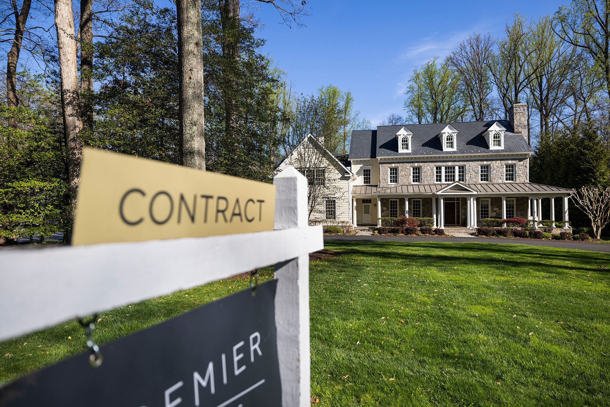 Mortgage rates dropped in mid-August, falling back toward the 5% mark following economic reports that indicated inflation might have finally peaked. A single-family home for sale in Maryland on April 14 is pictured here.