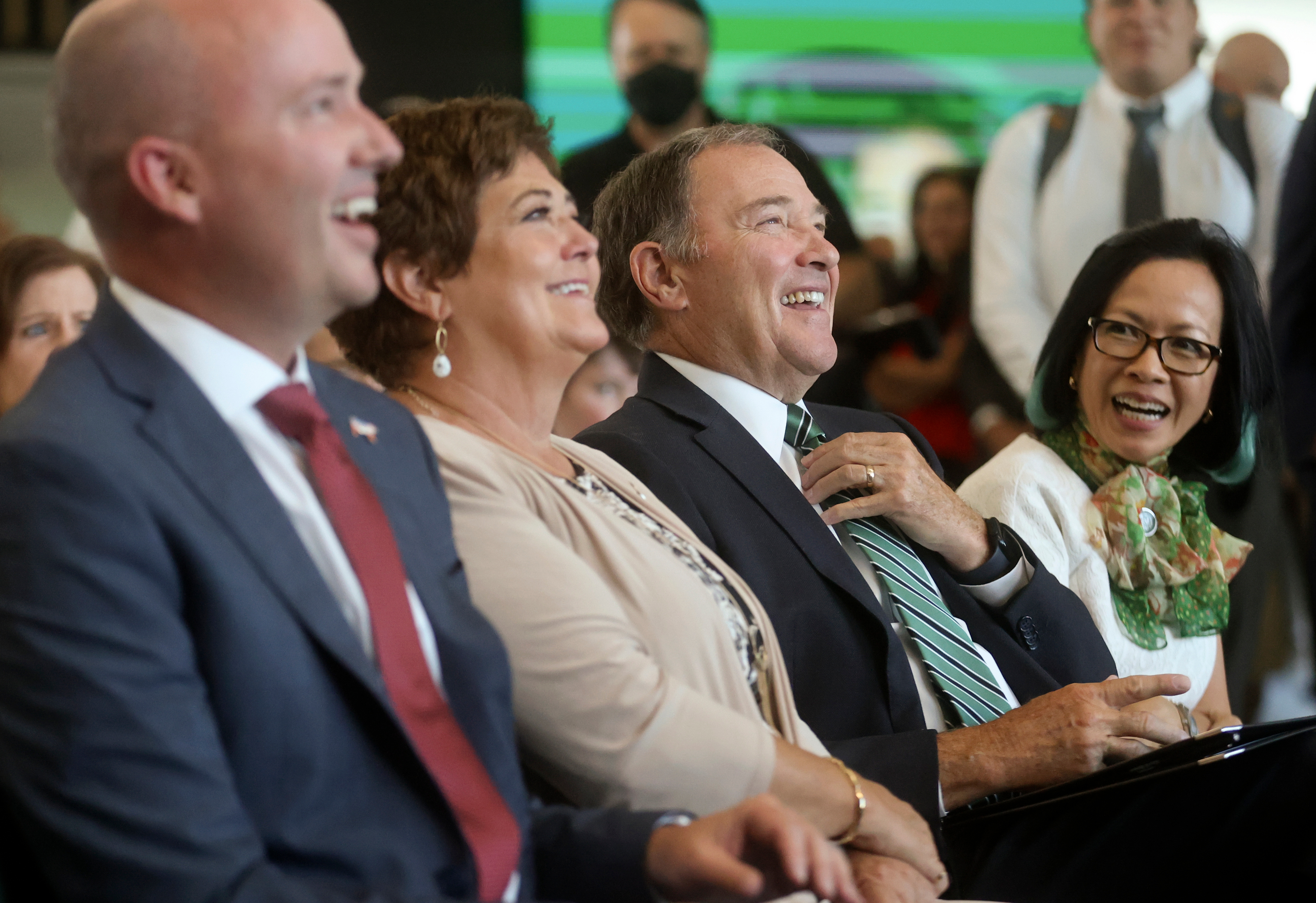 Gov. Spencer Cox, left, former first lady Jeanette Herbert, former Gov. Gary Herbert and Utah Valley University President Astrid S. Tuminez react to remarks during the opening celebration for the Gary R. Herbert Institute for Public Policy at the Orem university on Thursday.