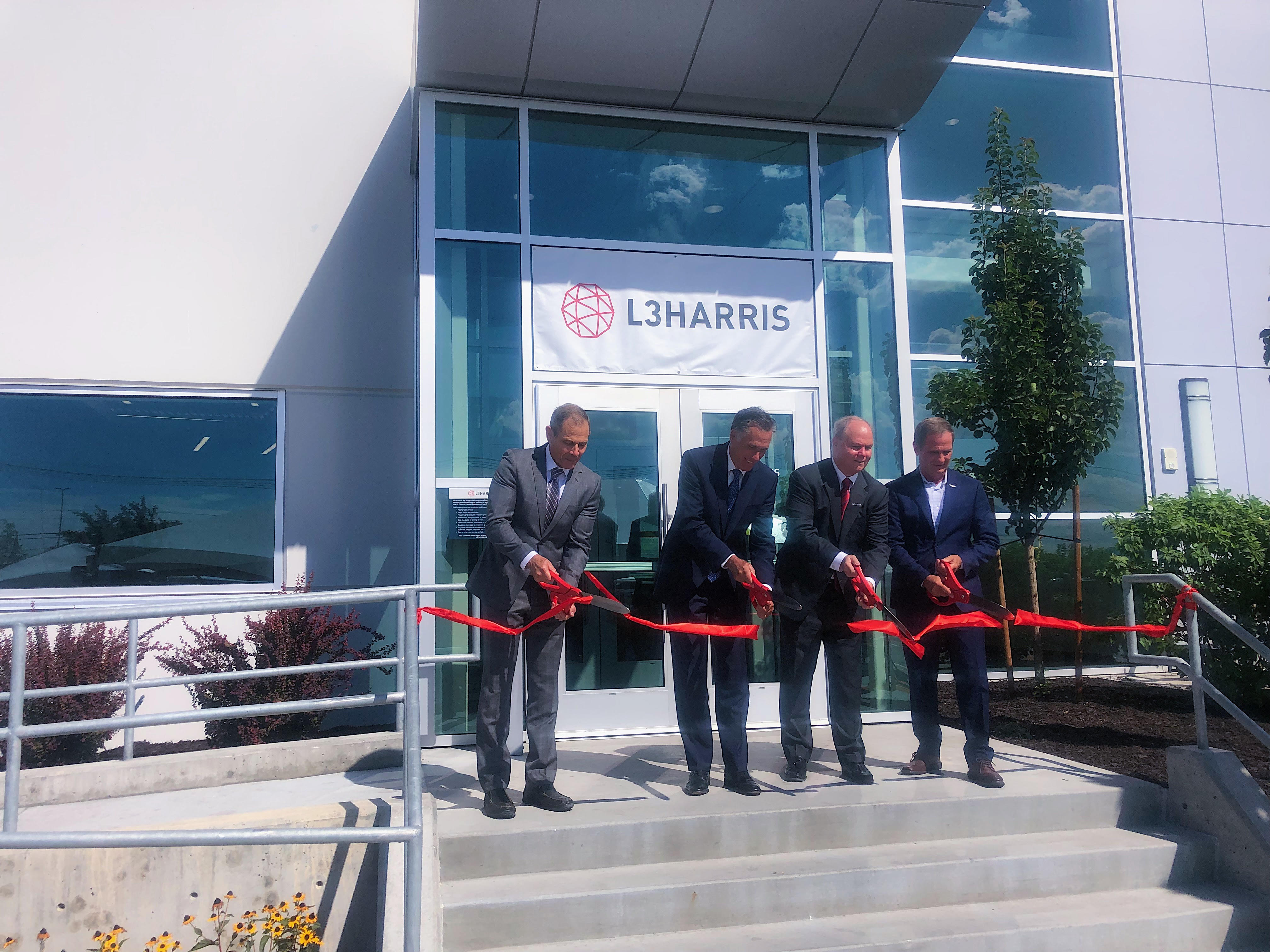 Rep. John Curtis, Sen. Mitt Romney, L3Harris President Brendan O'Connell and Rep. Chris Stewart cut the ribbon for L3Harris' new manufacturing and operations facility in Salt Lake City on Thursday.