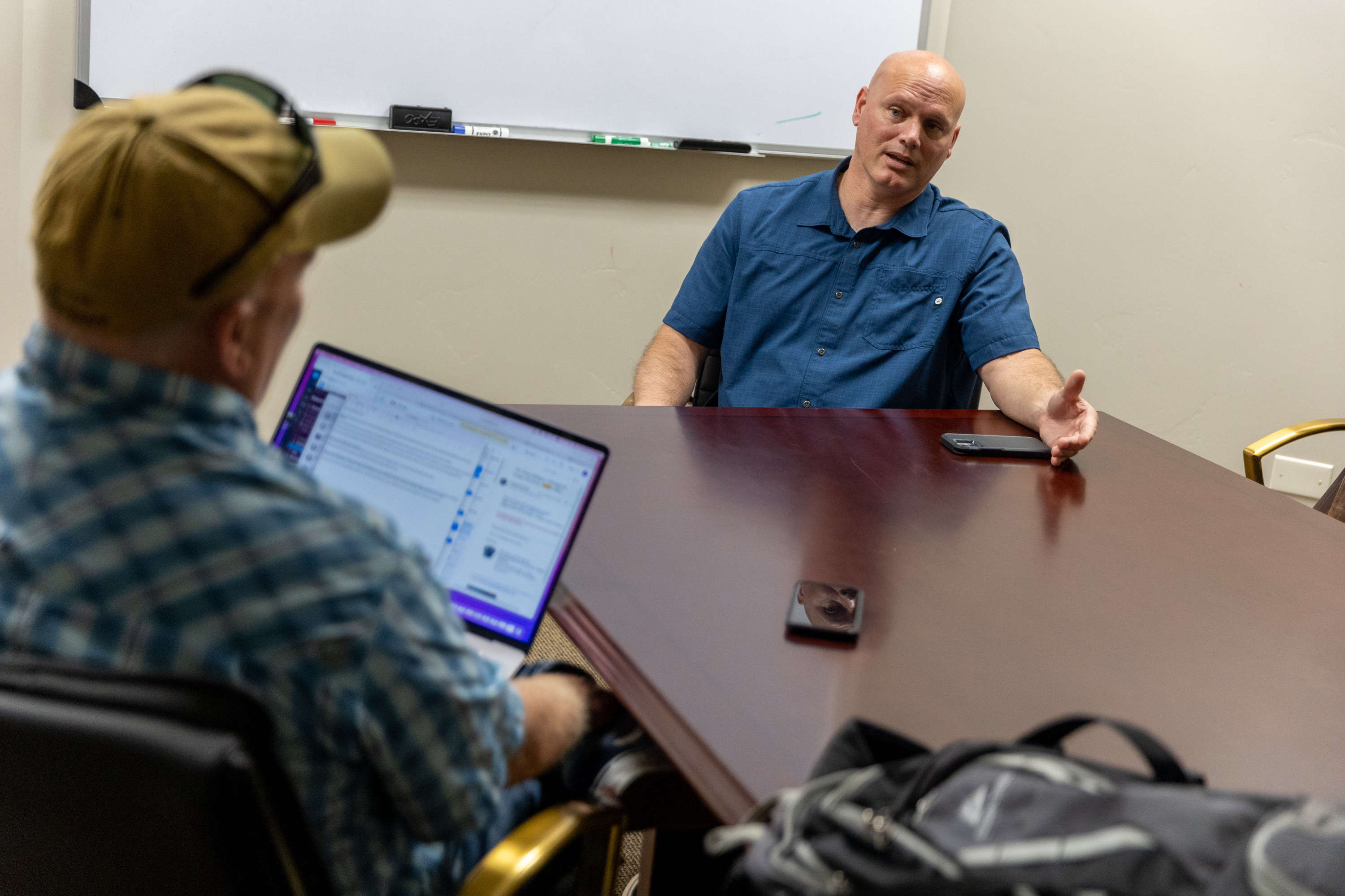 KSL.com reporter Pat Reavy, left, interviews, Scott Stephenson, the new head of the Utah Fraternal Order of Police, at Nelson Jones, a law firm in Sandy, on Thursday, Aug. 11.