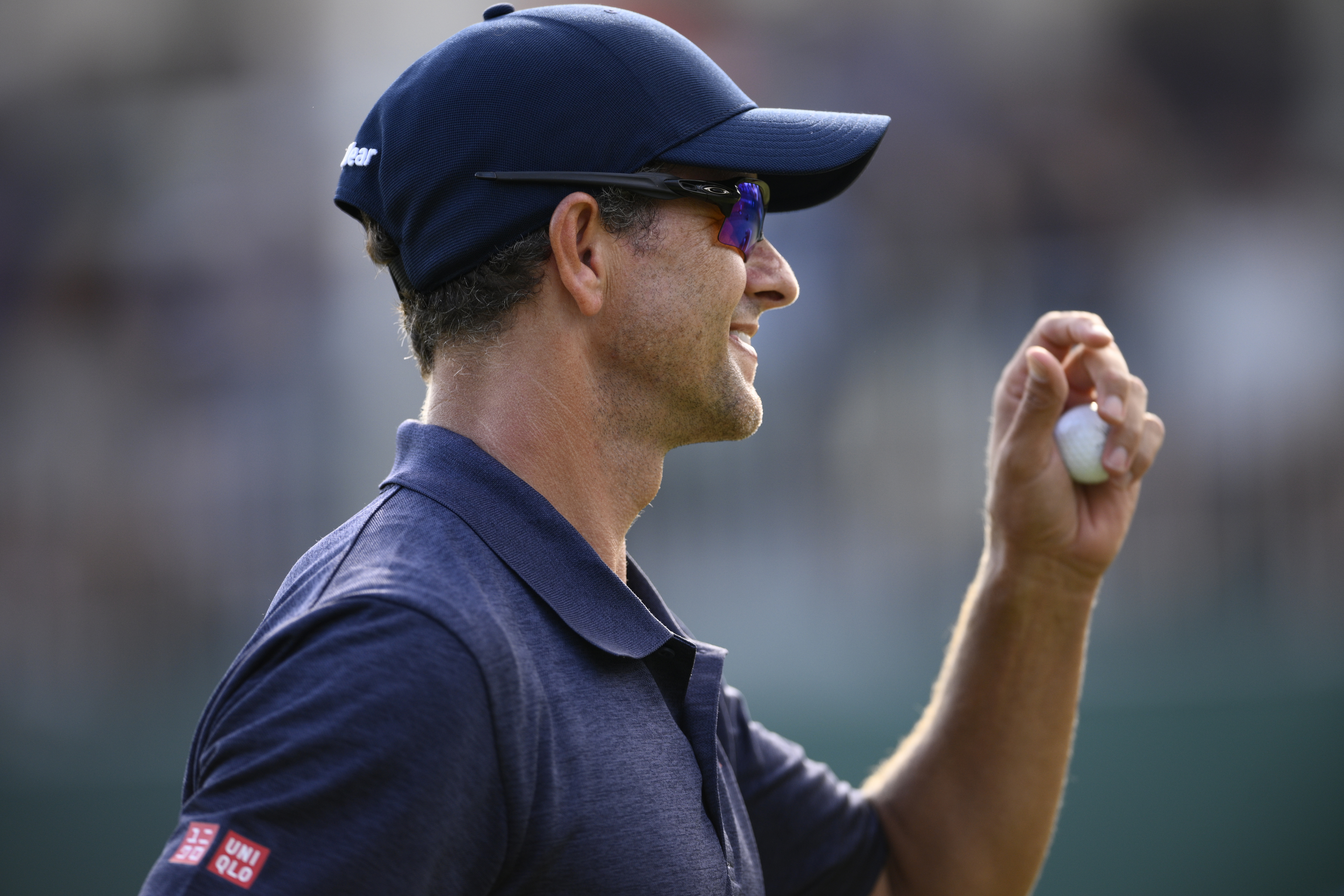 Adam Scott, of Australia, smiles as he finishes his round on the 18th green during the second round of the BMW Championship golf tournament at Wilmington Country Club, Friday, Aug. 19, 2022, in Wilmington, Del.