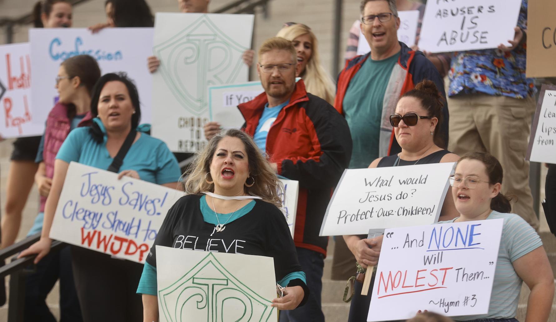 Protesters gather at the state Capitol in Salt Lake City on Friday to encourage Utah to eliminate a clergy abuse reporting exemption in state law.