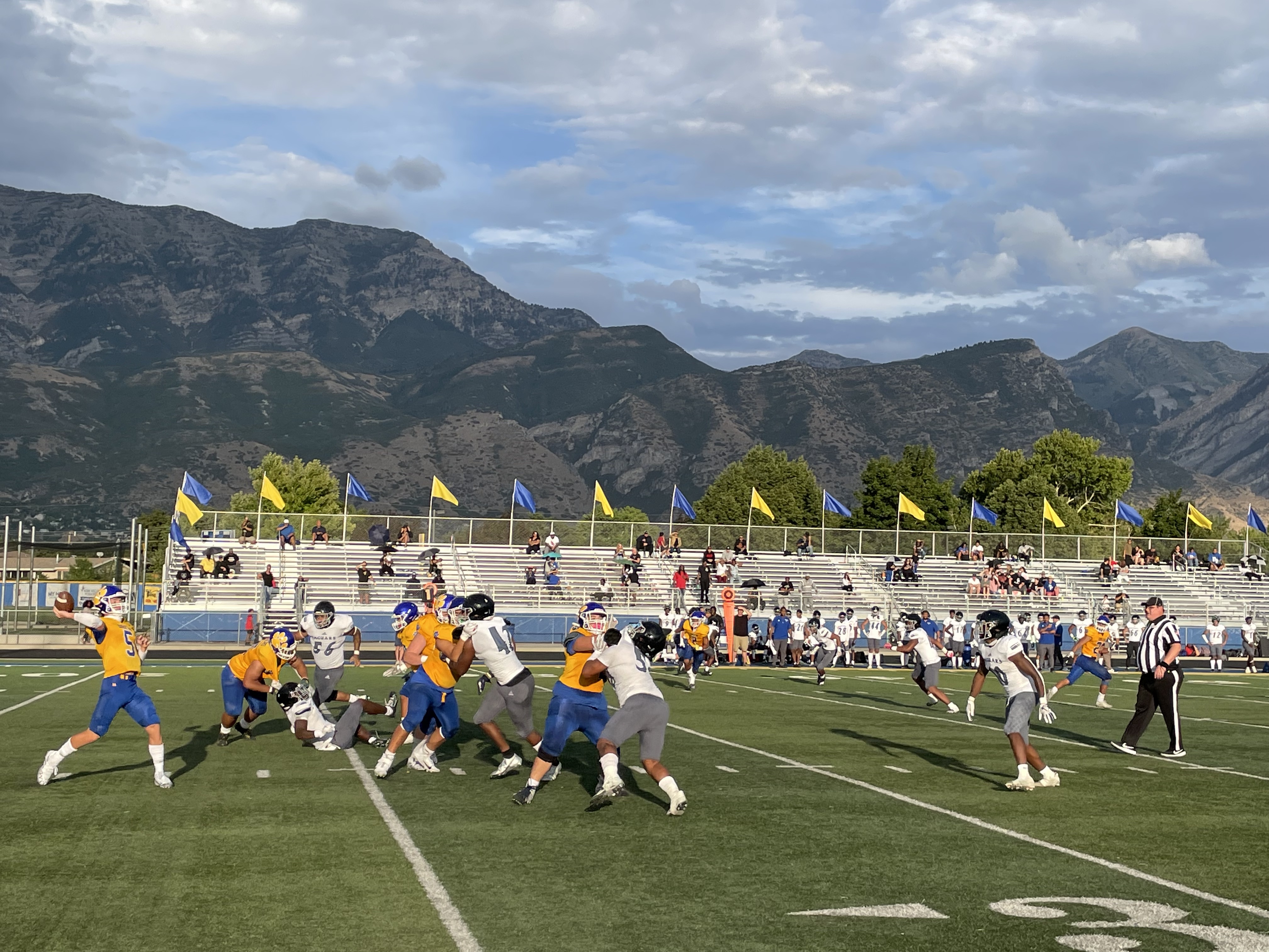 Quarterback Lance Reynolds (5) prepares to throw a pass during a game against Desert Pines (NV) High School on August 19, 2022.