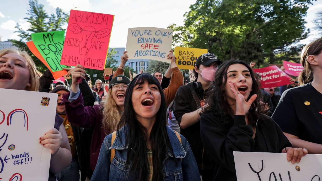 Protesters chant during a rally for abortion rights at Washington Park in Salt Lake City on May 3. Sixteen more states, including Utah, are asking to weigh in on the U.S. Department of Justice's lawsuit against Idaho over its strict abortion ban.