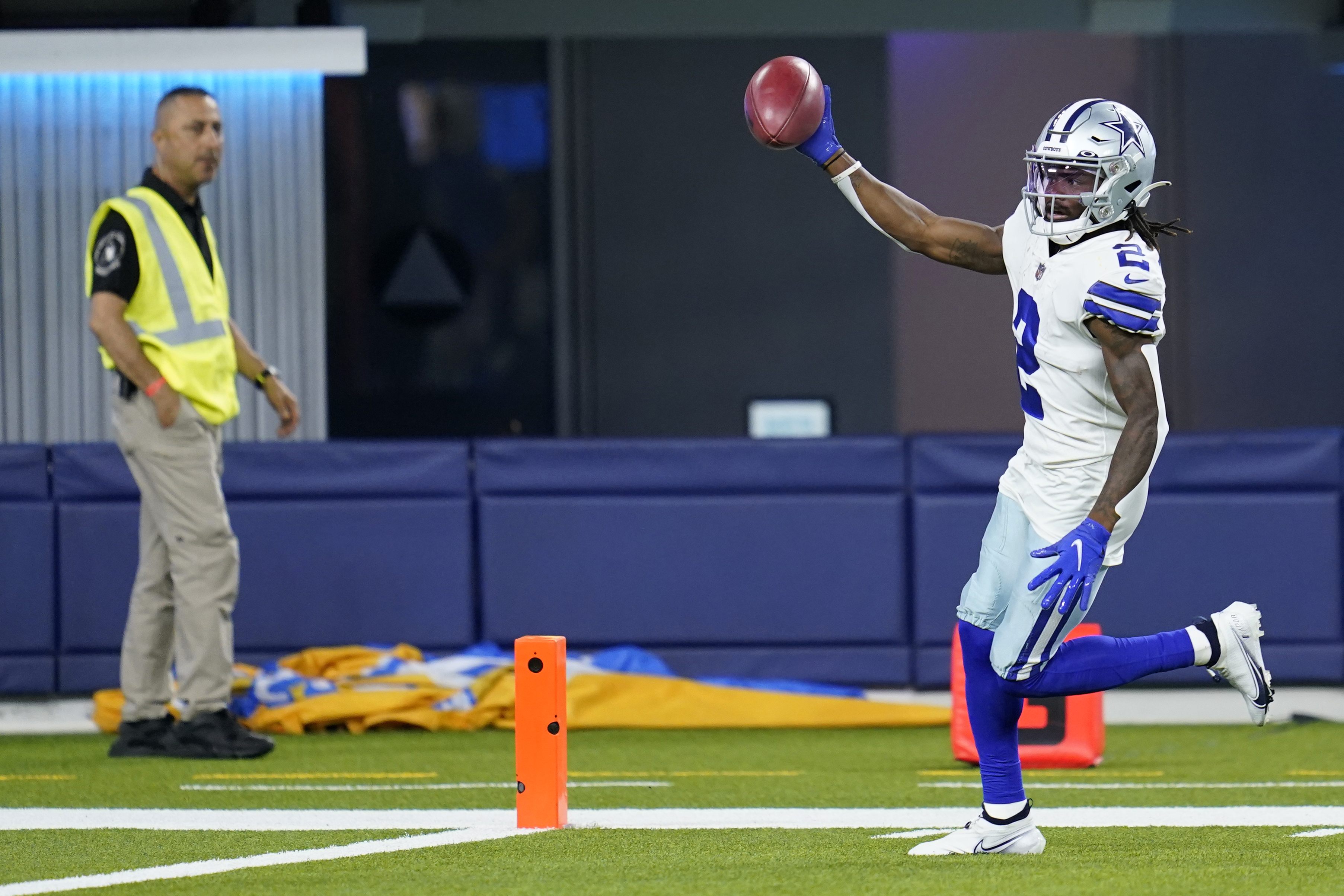 Dallas Cowboys' KaVontae Turpin celebrates as he returns a punt for a touchdown during the first half of a preseason NFL football game against the Los Angeles Chargers Saturday, Aug. 20, 2022, in Inglewood, Calif.