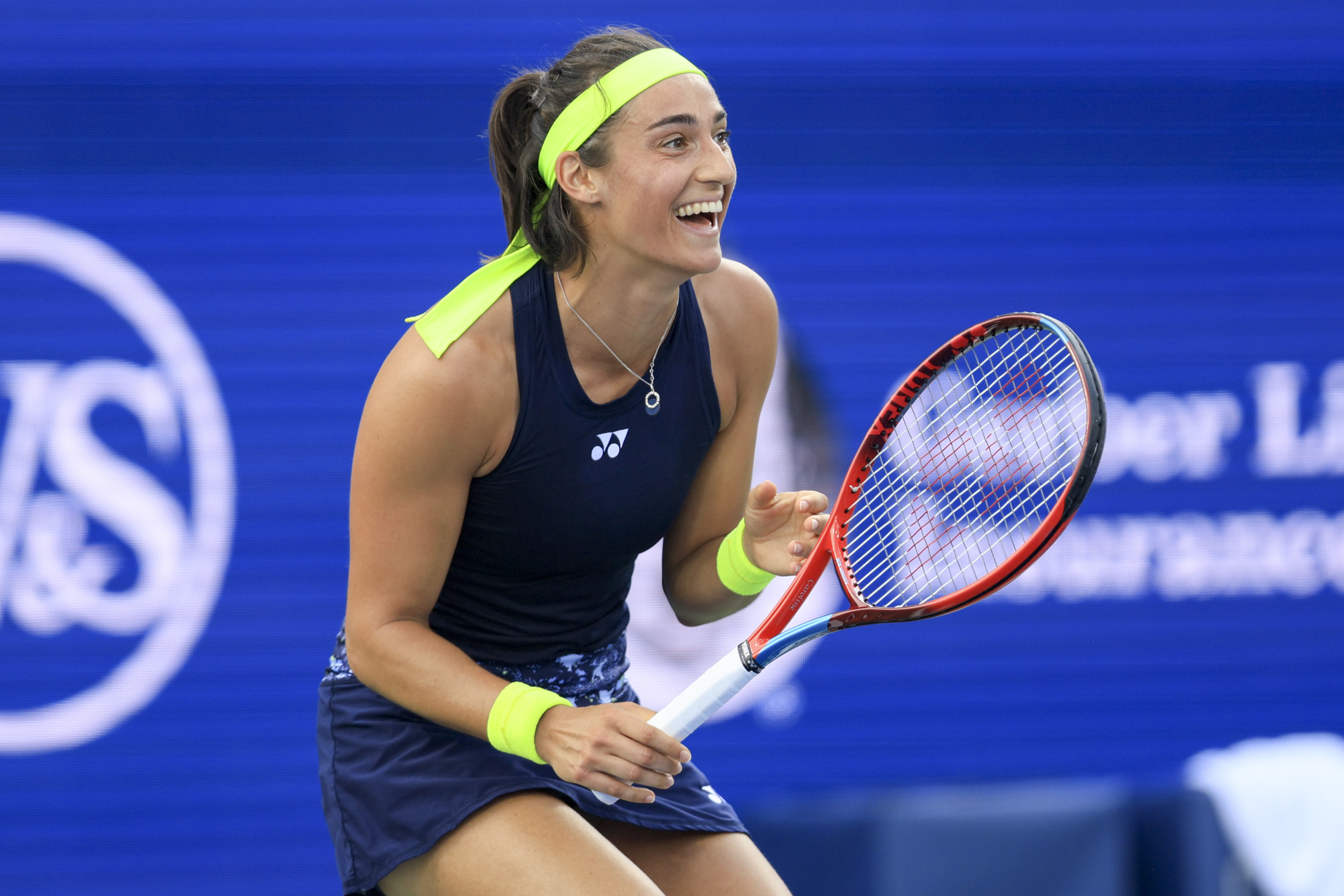 Caroline Garcia, of France, reacts as she defeats Petra Kvitova, of the Czech Republic, during the women's singles final of the Western & Southern Open tennis tournament, Sunday, Aug. 21, 2022, in Mason, Ohio. 