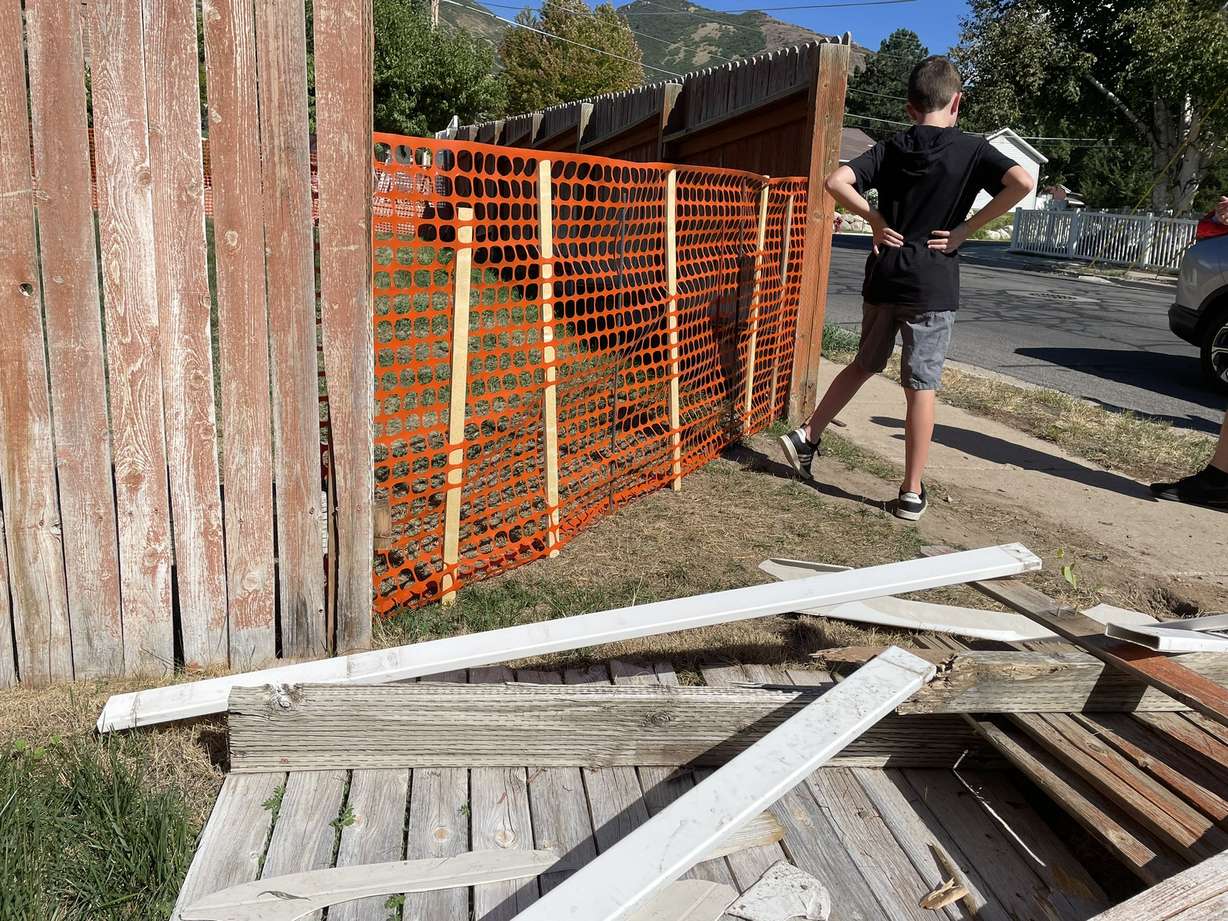 A broken fence is pictured Sunday, near 400 East and Chase Lane in Centerville. Homeowners are frustrated after they say multiple cars have crashed into the fence over time, including Saturday night.