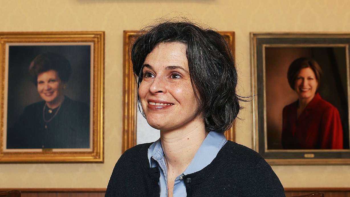 Kate Holbrook answers questions at the Relief Society Building in Salt Lake City, Feb. 22, 2016. Holbrook died on Saturday, at age 50.