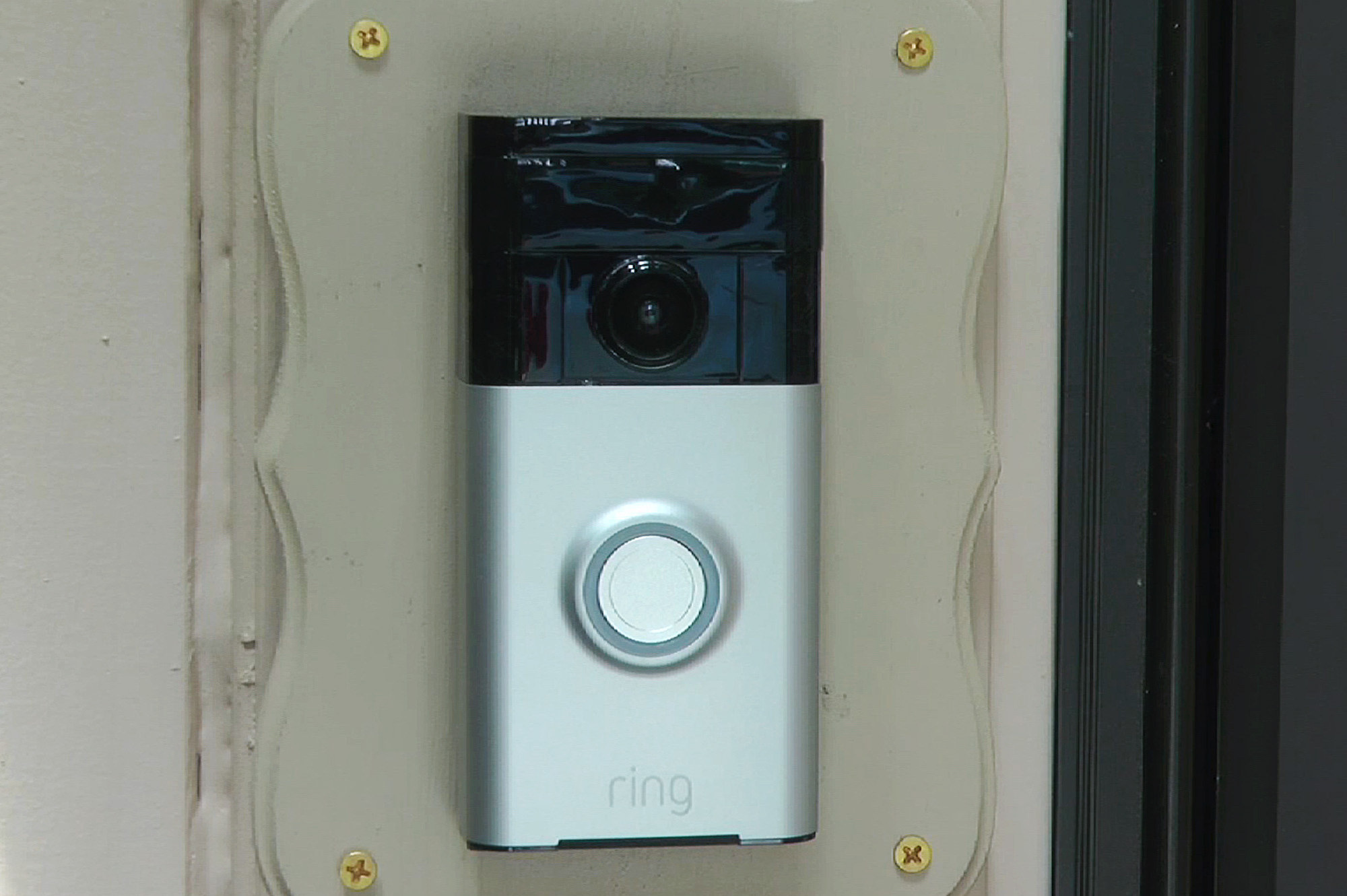In this June 28, 2019, image made from video, a Ring doorbell camera is shown at a home in Coon Rapids, Minn. From what you buy online, to how you remember tasks, to when you monitor your doorstep, Amazon is seemingly everywhere.