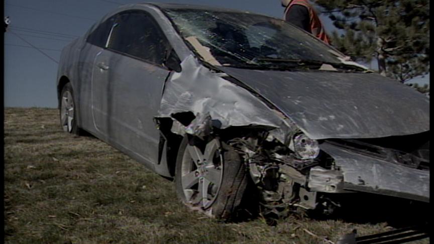 Woman Crashes Car through Backyards