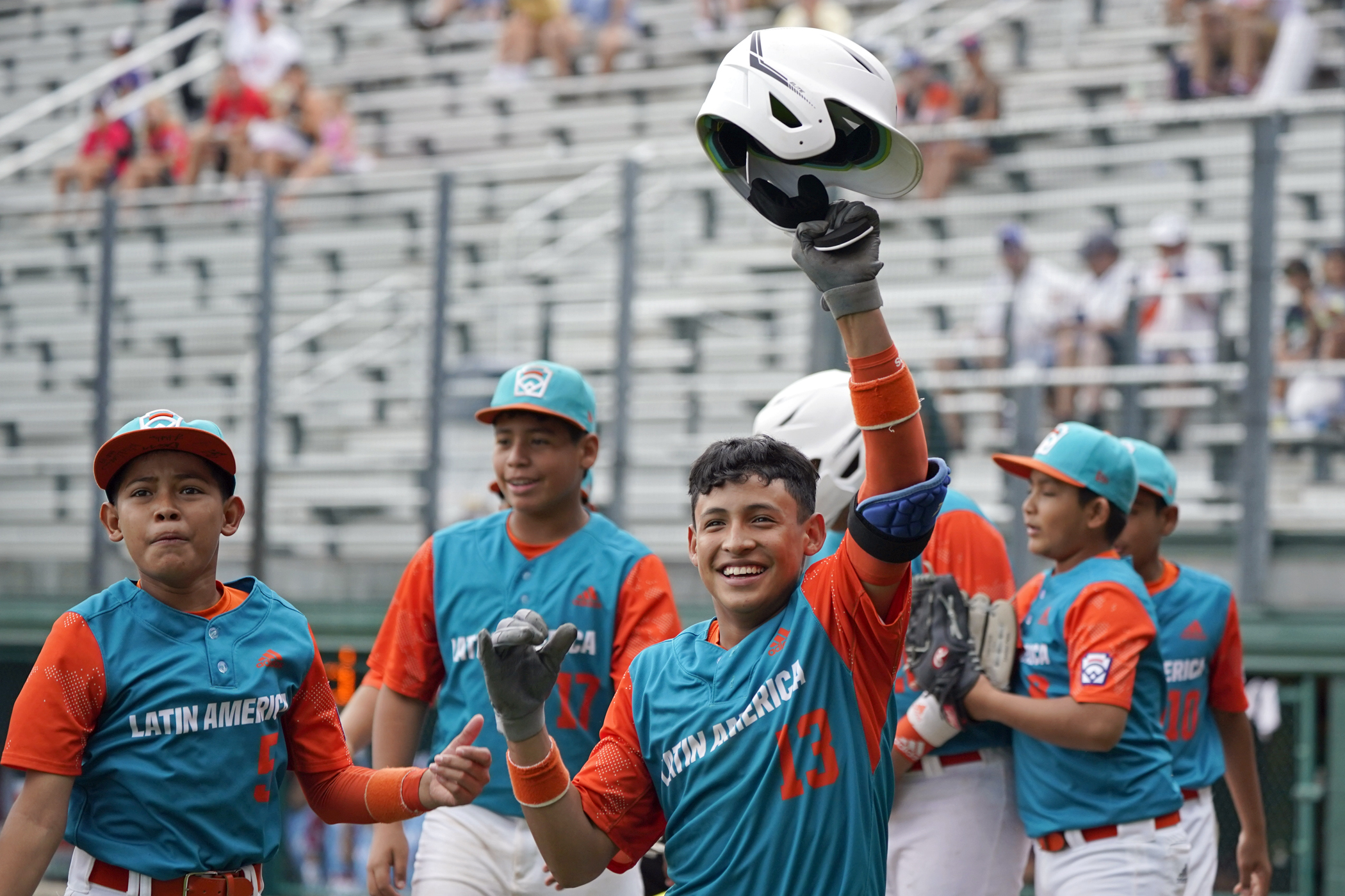 Nicaragua's Luis Garcia (13) celebrates on the way back to the dugout after his three run home run off of Panama pitcher Gabriel de Gracia during the fourth inning of a baseball game at the Little League World Series tournament in South Williamsport, Pa., Tuesday, Aug. 23, 2022. Nicaragua won the game 8-1.
