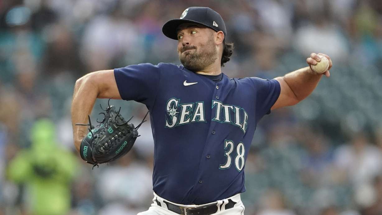 Seattle Mariners starting pitcher Robbie Ray throws against the Washington Nationals during the first inning of a baseball game, Tuesday, Aug. 23, 2022 in Seattle.