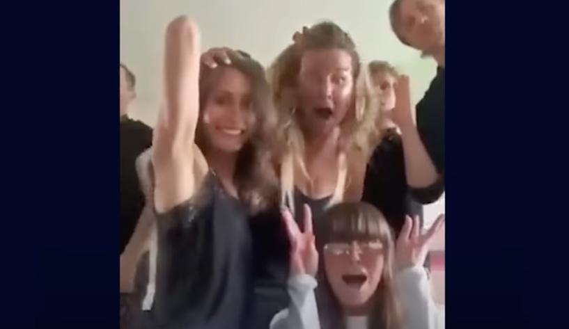 Finland Prime Minister Sanna Marin, left, is seen dancing with friends in a video that was leaked to the public last week.