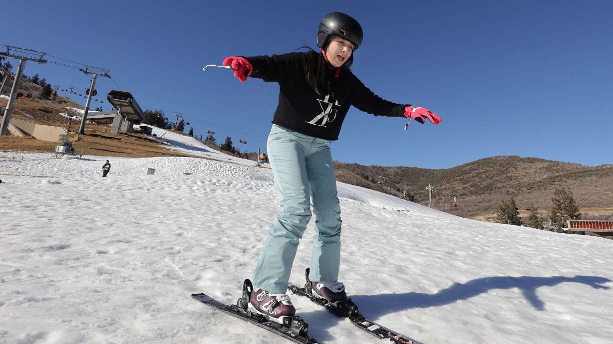 First-time skier Camila Mendoza, of Ecuador, practices skiing at Park City Mountain Resort's Canyons Village in Park City on Nov. 28, 2021. This winter, Utah's largest ski resort will undergo changes making it more expensive for patrons.