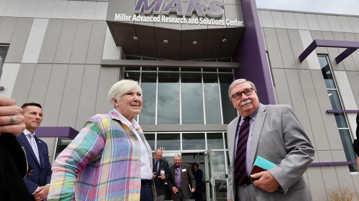 Gail Miller and her husband Kim R. Wilson, attend the ribbon cutting at the Miller Advanced Research and Solutions Center in Clearfield on Wednesday. The facility will create opportunities for research and innovative solutions to real-world problems in the realm of national defense and aerospace.