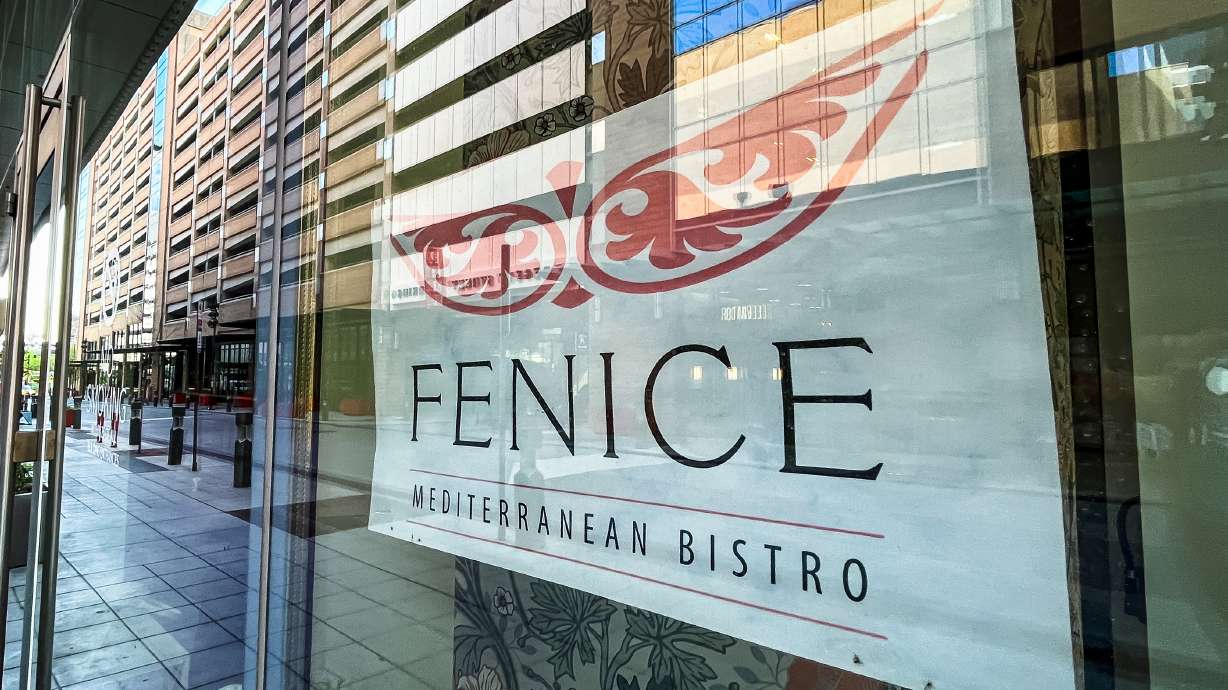 A sign outside of Fenice Mediterranean Bistro in Salt Lake City on Wednesday. The owners announced this week that they are indefinitely closed because of "many challenges facing small businesses."