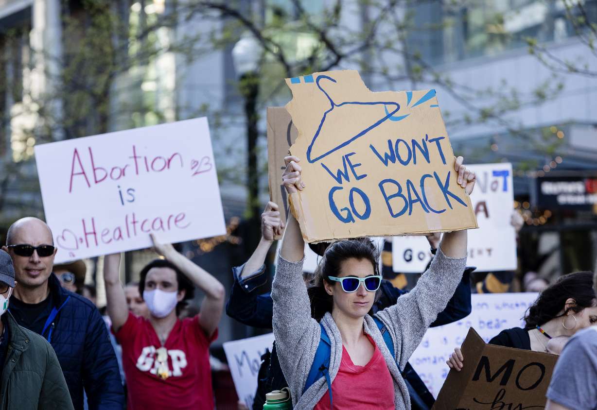 People march through 8th Street in downtown Boise, Idaho, on May 3, in response to the news that the U.S. Supreme Court could be poised to overturn the landmark Roe v. Wade case that legalized abortion nationwide.
