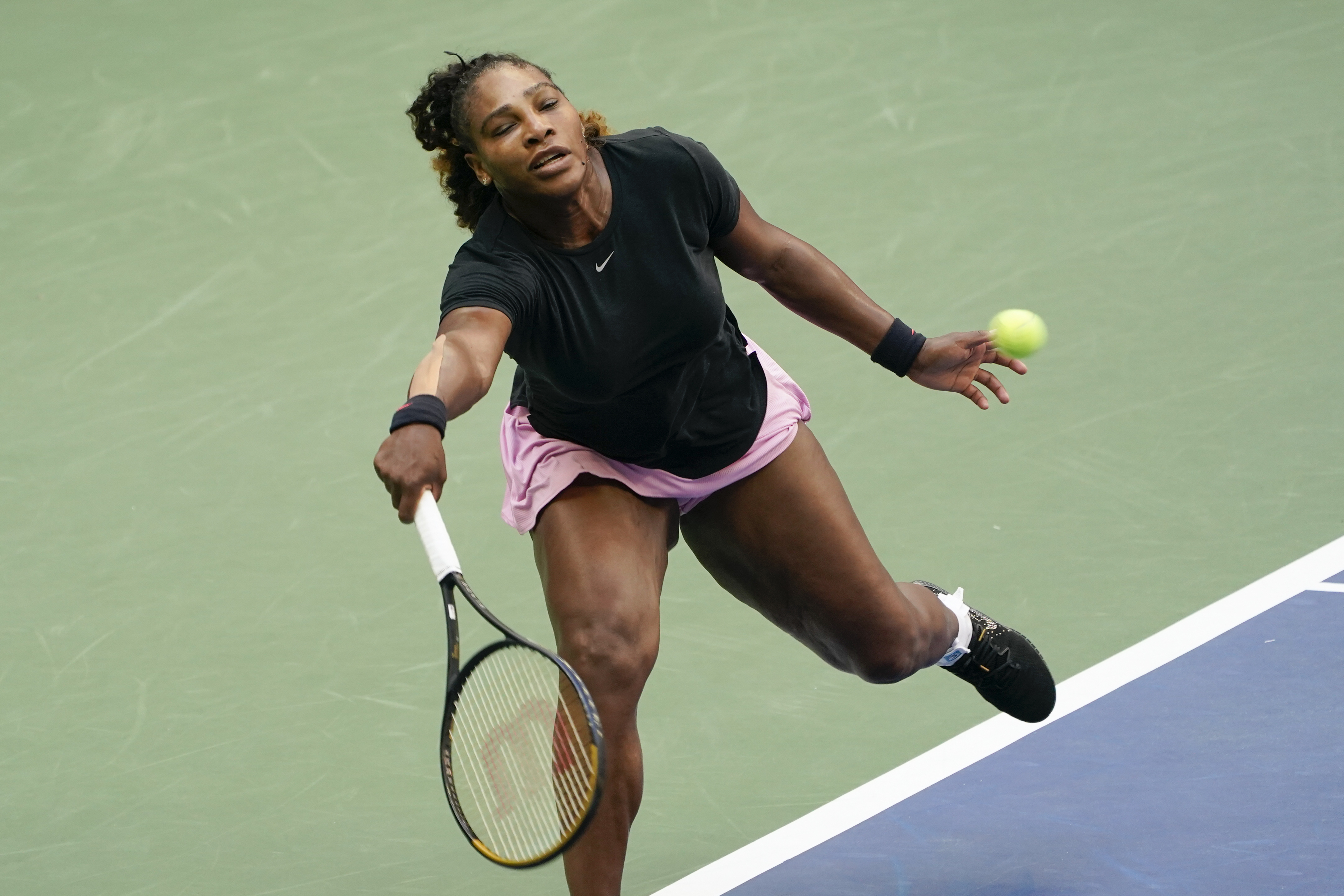 Serena Williams practices at Arthur Ashe Stadium before the start of the U.S. Open tennis tournament in New York, Thursday, Aug. 25, 2022. 