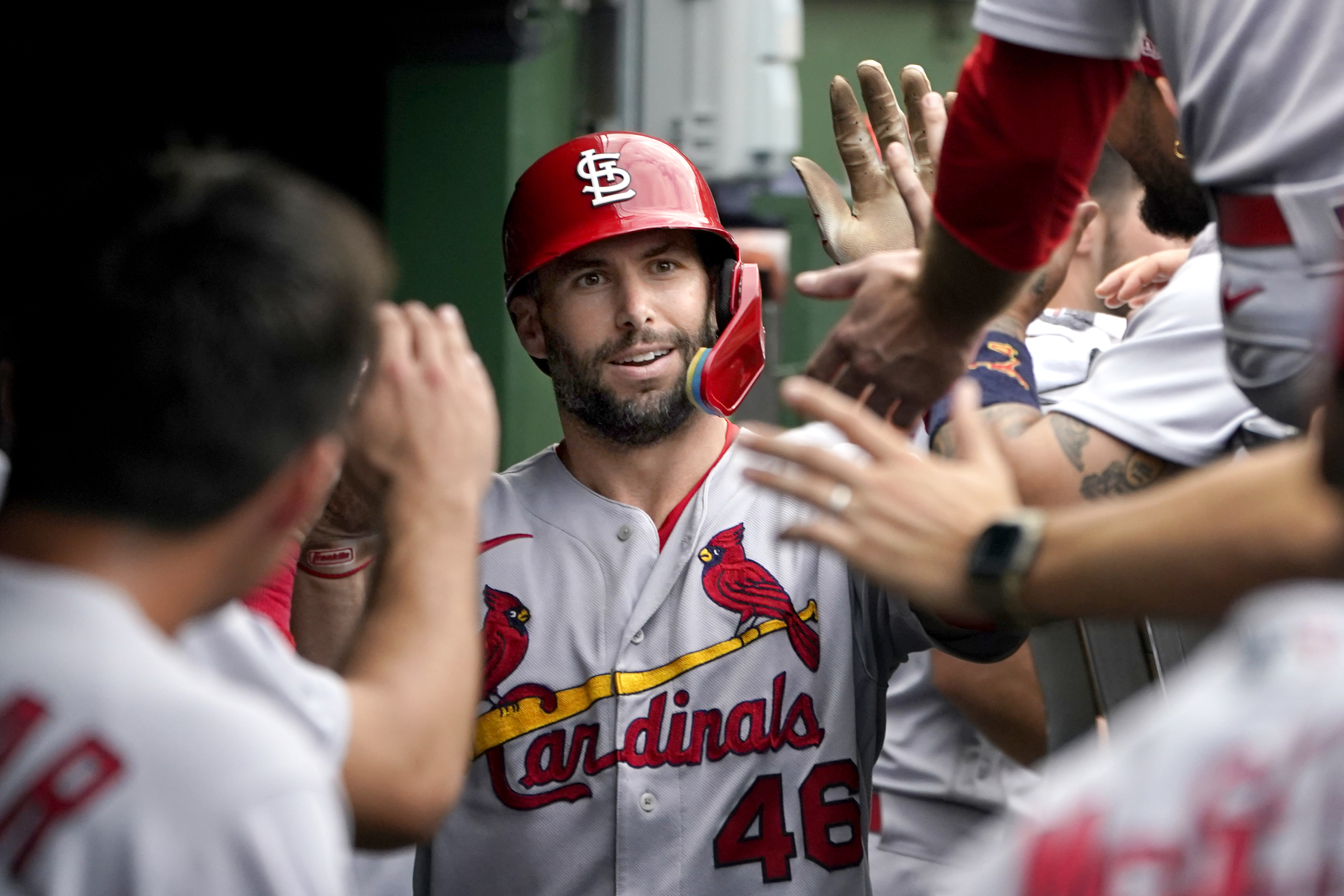 St. Louis Cardinals' Paul Goldschmidt celebrates in the dugout his homer off Chicago Cubs relief pitcher Sean Newcomb during the sixth inning of a baseball game against the Chicago Cubs Thursday, Aug. 25, 2022, in Chicago. 