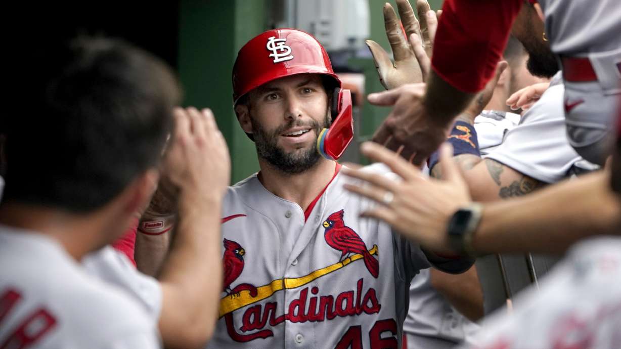 St. Louis Cardinals' Paul Goldschmidt celebrates in the dugout his homer off Chicago Cubs relief pitcher Sean Newcomb during the sixth inning of a baseball game against the Chicago Cubs Thursday, Aug. 25, 2022, in Chicago.