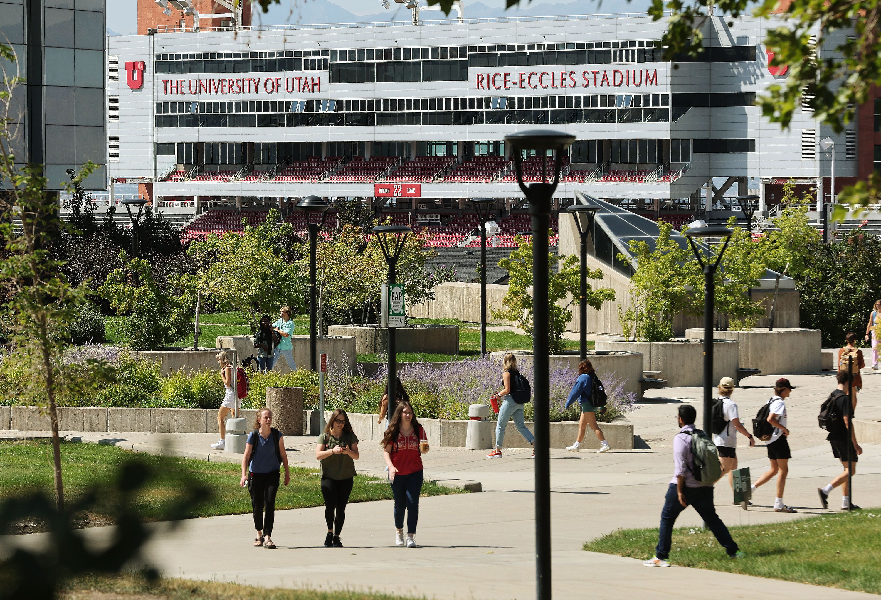 Students walk on the University of Utah campus in Salt Lake City on Tuesday. Many Utah college students are figuring out if President Joe Biden’s loan debt cancellation applies to them.