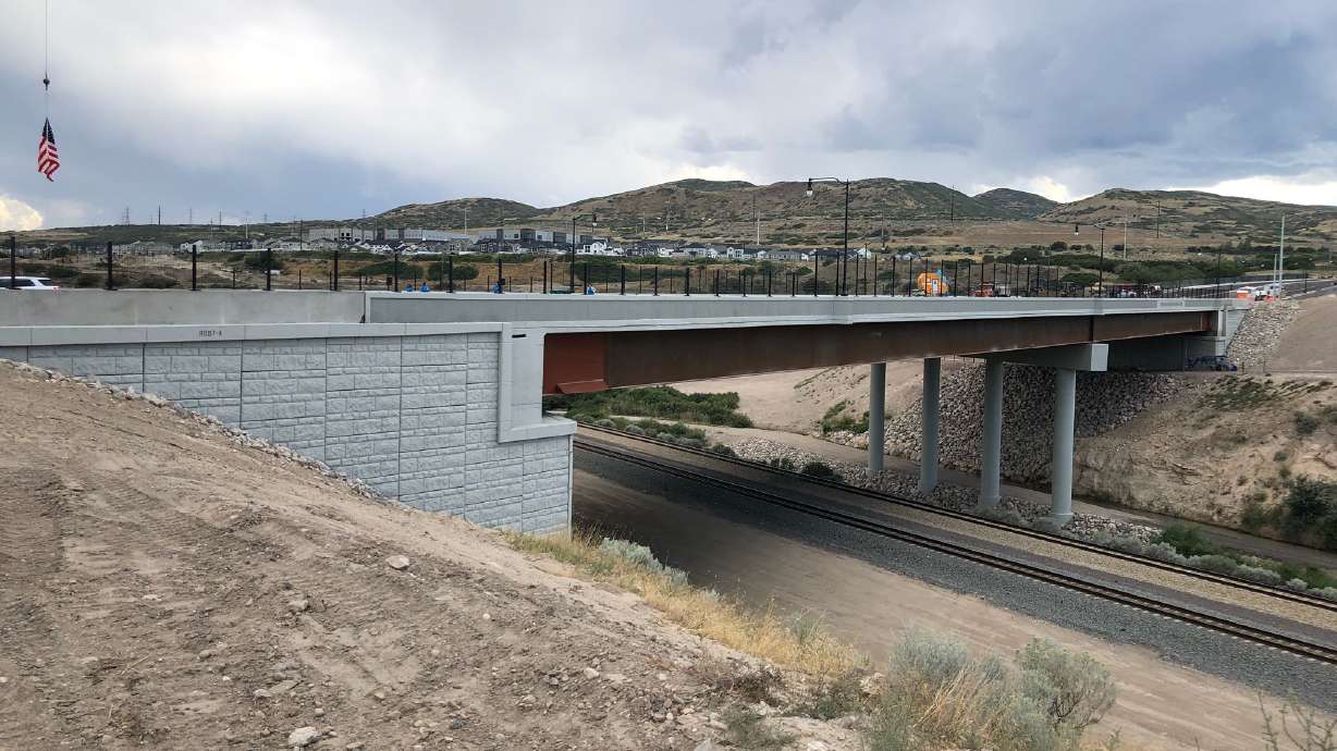 A photo of the the new bridge that completes Porter Rockwell Boulevard taken on Thursday. The route offers a vital east-west connection in Salt Lake County, according to the Utah Department of Transportation.