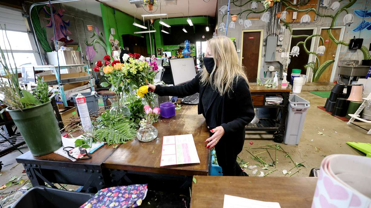 Marci Rasmussen, owner of Especially For You Your Downtown Florist, works on a floral arrangement at her shop in Salt Lake City on Jan. 12, 2021. Small businesses and artists in Salt Lake City that have been negatively impacted by the aftershock of the COVID-19 pandemic will breathe a collective sigh of relief as they will have the opportunity to apply for funds from a pool of $2 million as part of the American Rescue Plan Act.