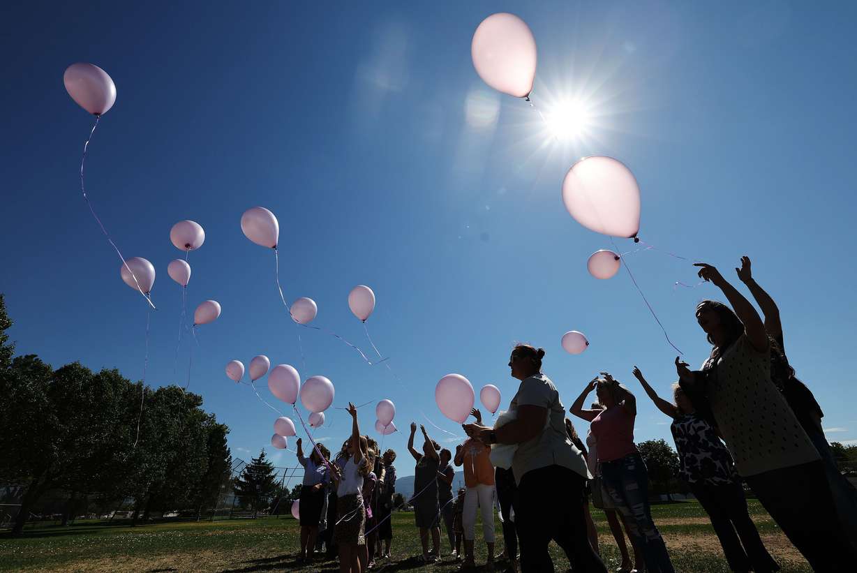 Balloons are released into the air in honor of Rachael Runyan, who was kidnapped and murdered in 1982, during a Missing and Exploited Children’s Day event at Rachael Runyan Memorial Park in Sunset on Friday.