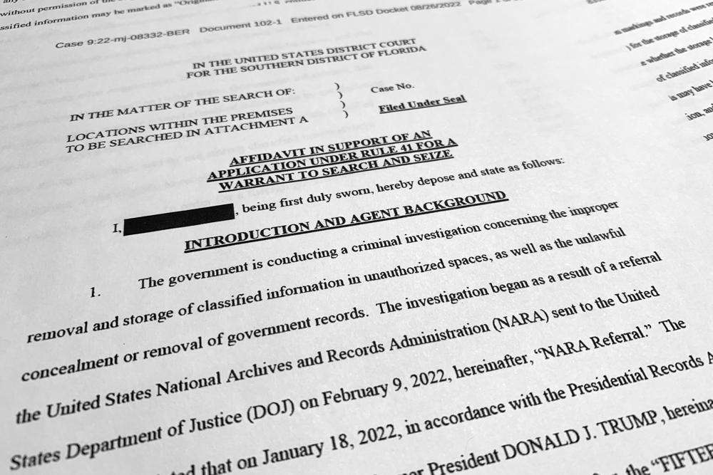 The affidavit by the FBI in support of obtaining a search warrant for former President Donald Trump's Mar-a-Lago estate is photographed Friday.