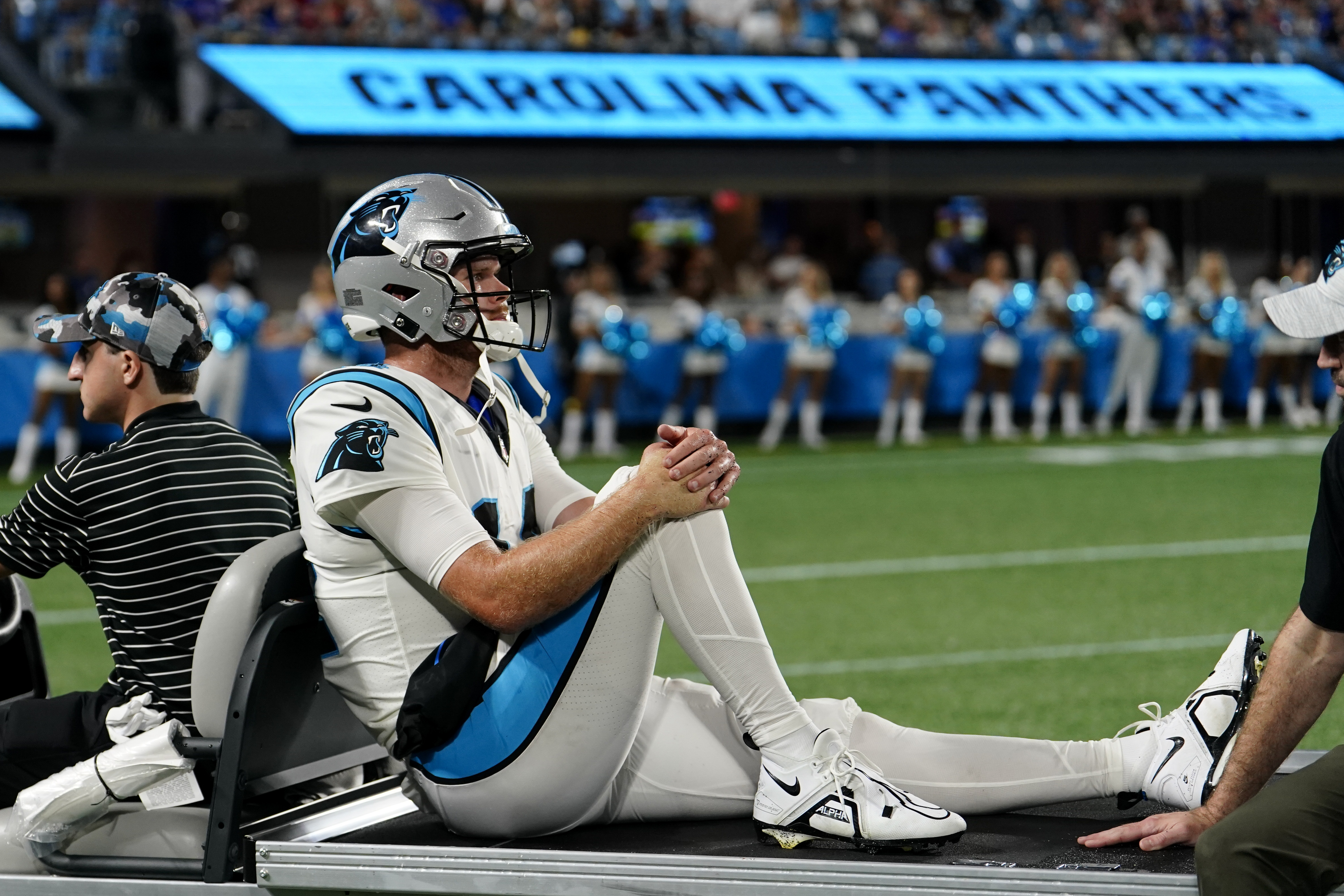 Carolina Panthers quarterback Sam Darnold leaves the field on a cart after getting injured during the second half of an NFL preseason football game against the Buffalo Bills on Friday, Aug. 26, 2022, in Charlotte, N.C. 