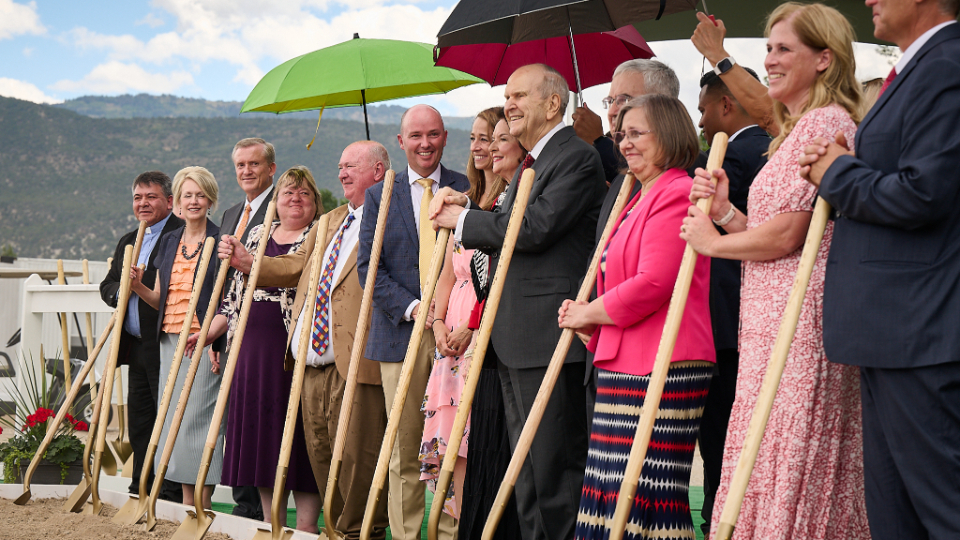 President Russell N. Nelson and other church leaders and dignitaries turn the soil at the groundbreaking of the Ephraim Utah Temple in Ephraim on Saturday.