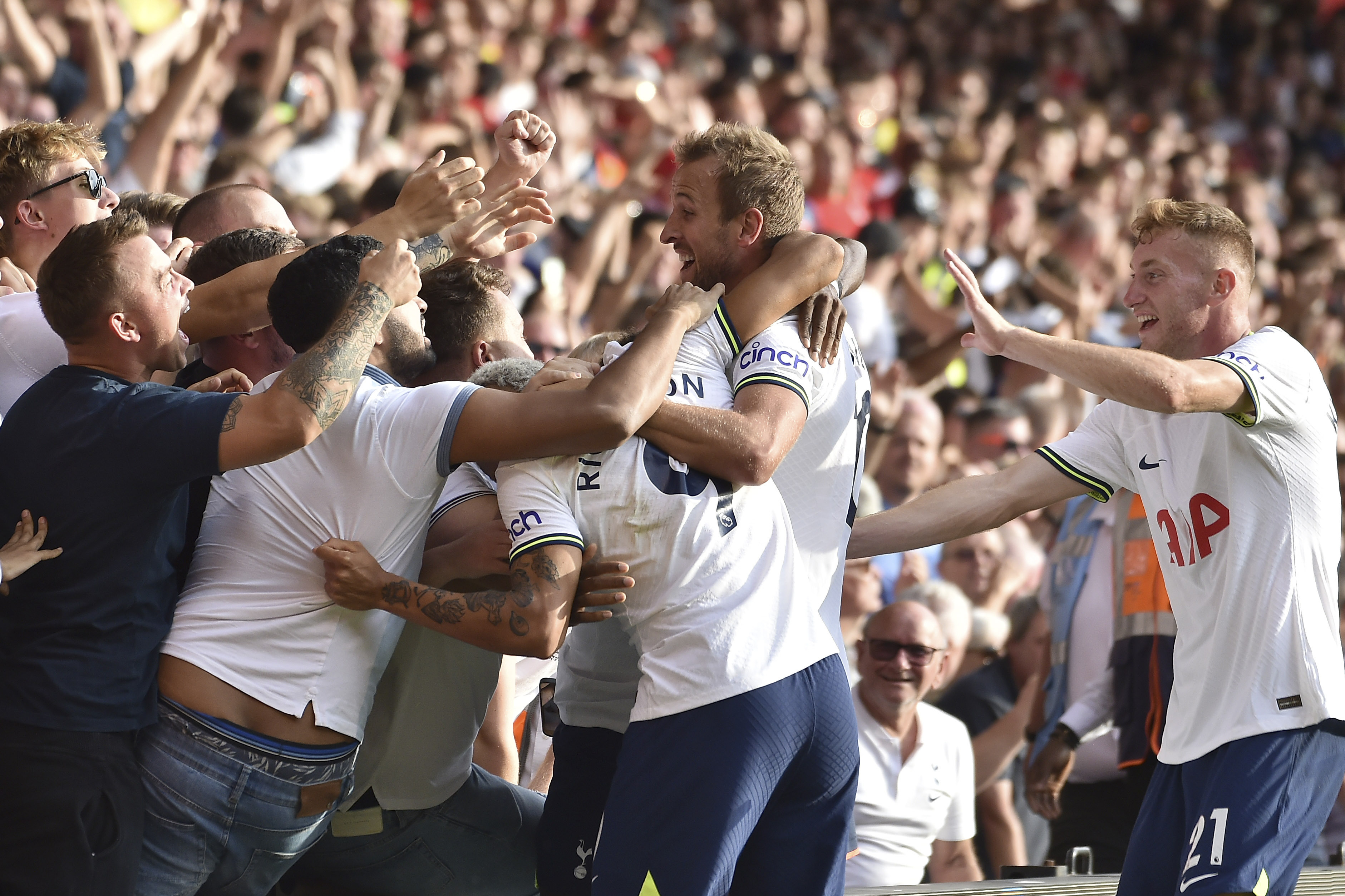 Tottenham's Harry Kane, centre, celebrates scoring his side's second goal during the English Premier League soccer match between Nottingham Forest and Tottenham Hotspur at the City Ground stadium in Nottingham, England, Sunday, Aug. 28, 2022.
