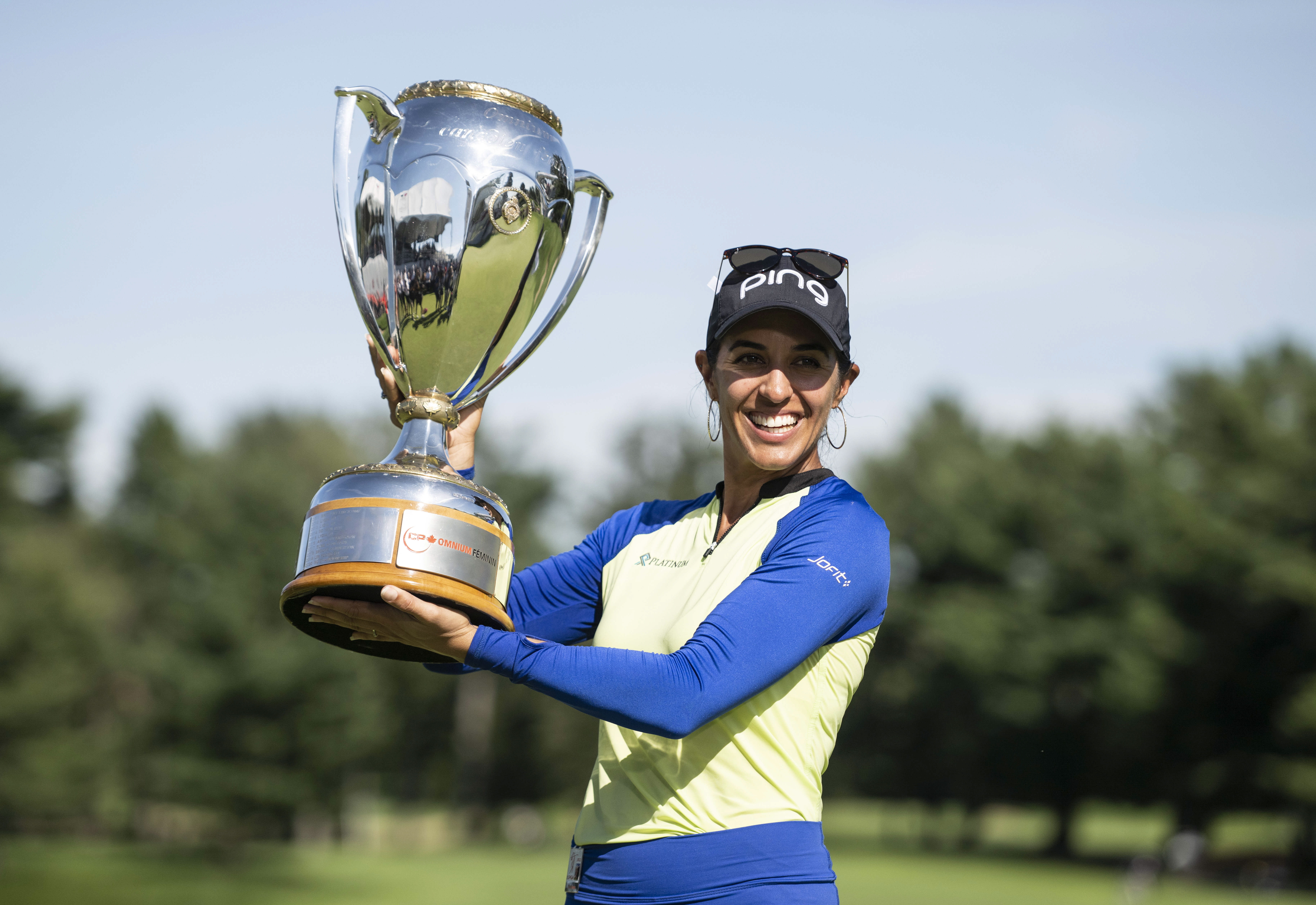 Paula Reto, of South Africa, holds the trophy after winning the the Canadian Pacific Women's Open golf tournament in Ottawa, on Sunday, Aug. 28, 2022.