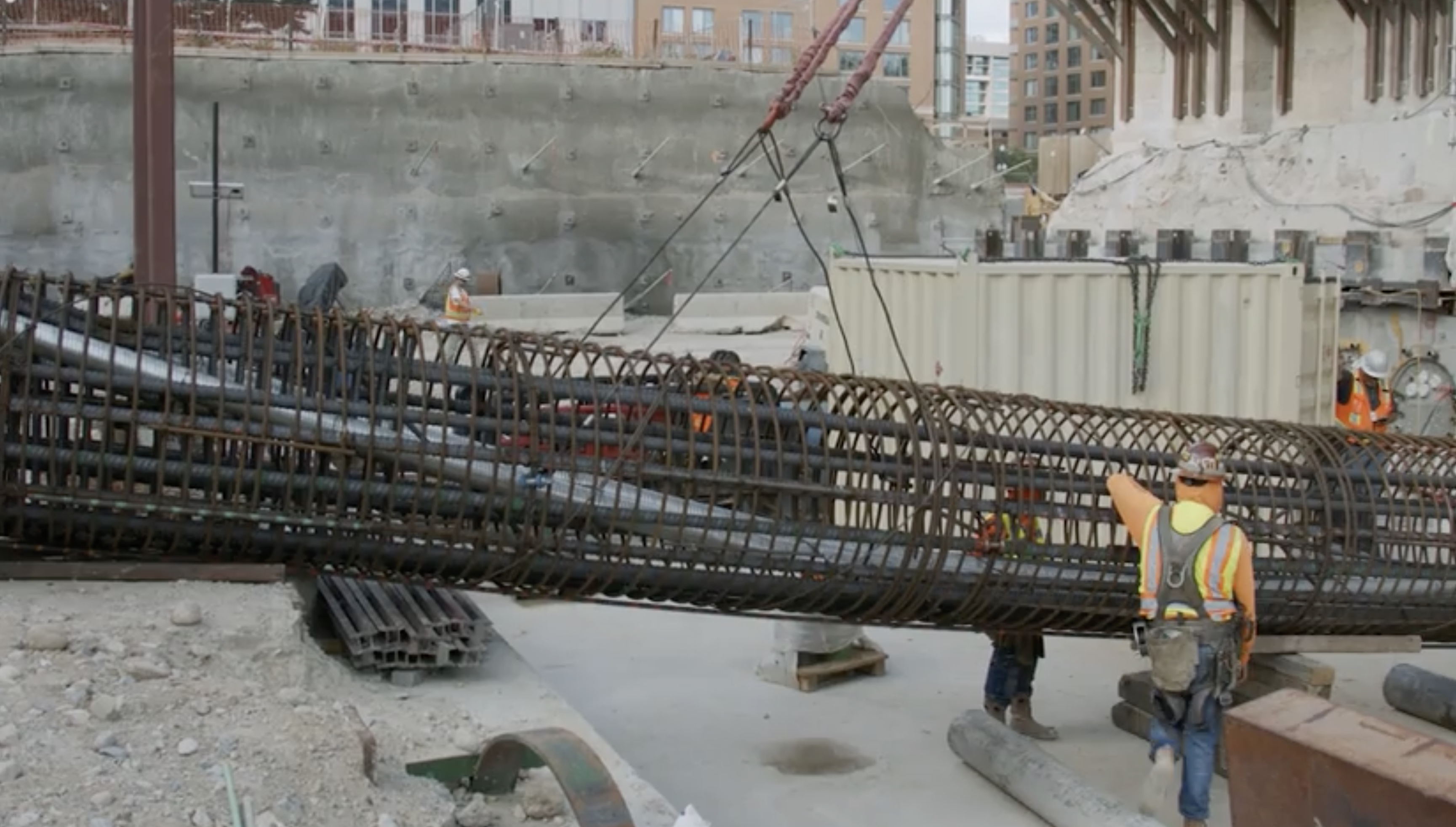 An undated photo of construction crews installing a rebar cage into a jack and bore pipe underneath the original foundation of the Salt Lake Temple. Crews have worked to install the new pipings this summer as a part of an ongoing project to improve the stability of the historic temple.