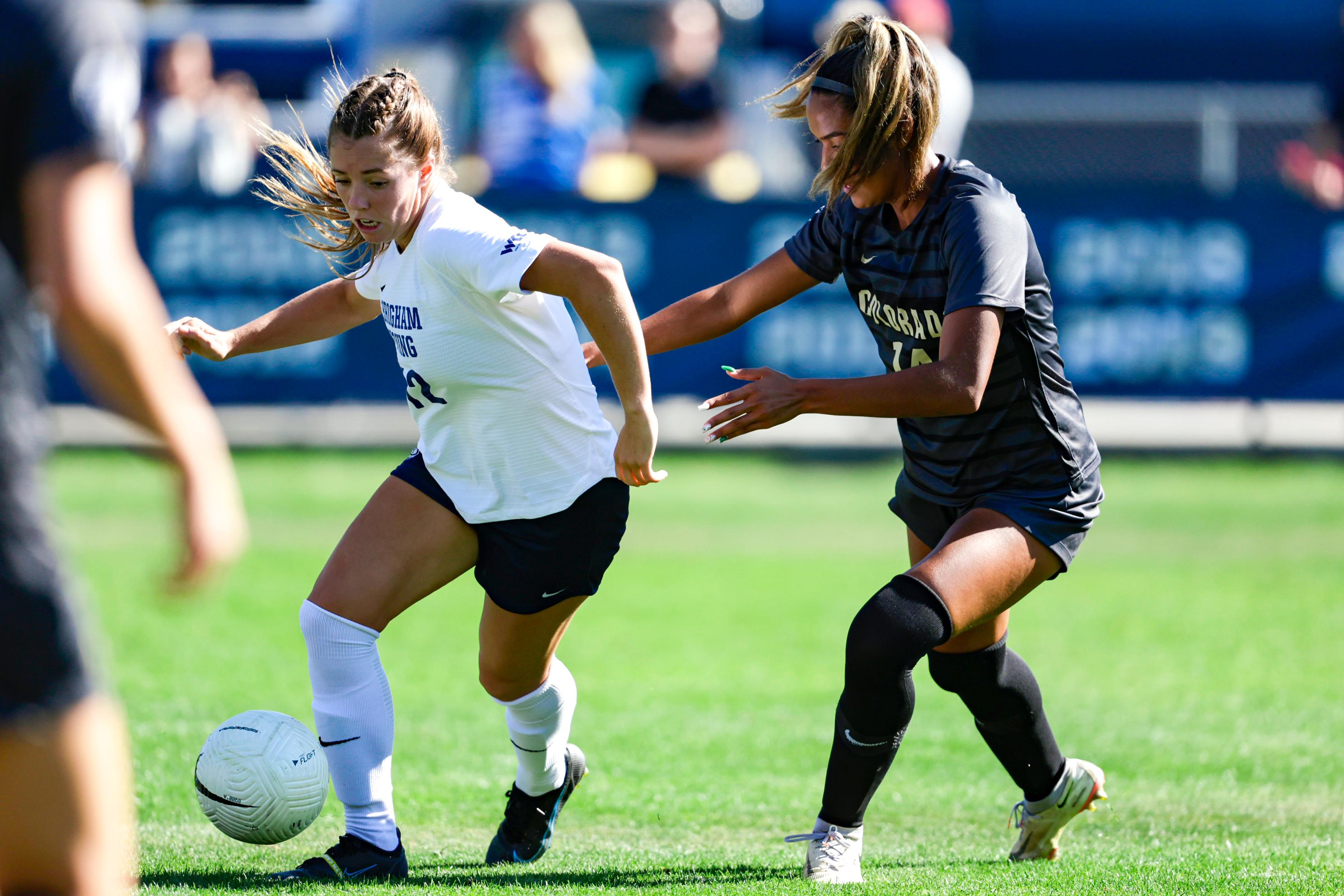 BYU midfielder Jamie Shepherd, left, goes toward goal during the Cougars' 2-2 draw with No. 25 Colorado, Monday, Aug. 29, 2022 at South Field in Provo.