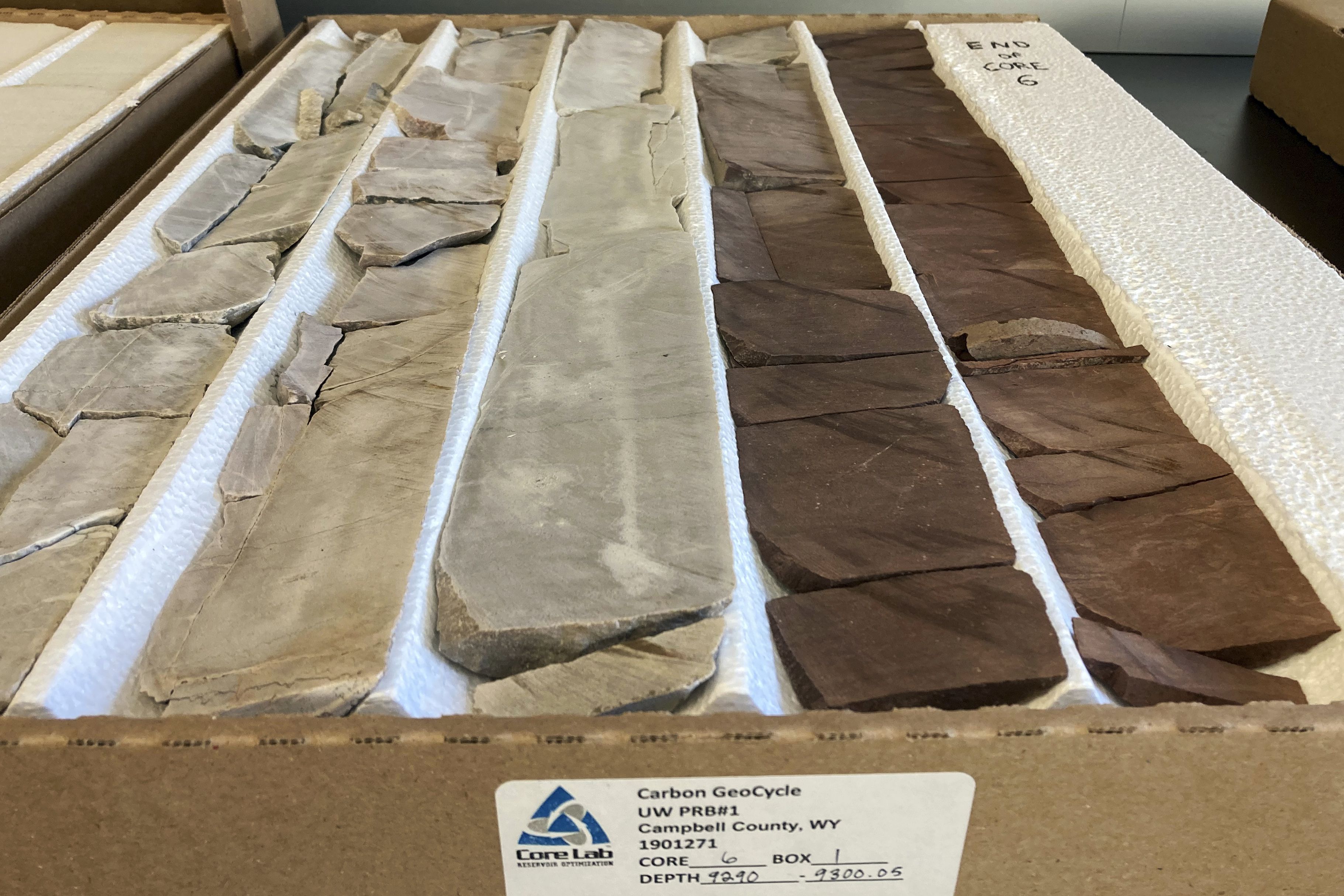 Rock samples taken from an almost 2-mile-deep well drilled in northeastern Wyoming to study the potential for storing carbon dioxide underground are displayed in a University of Wyoming School of Energy Resources lab on Aug. 10, in Laramie, Wyo. New federal tax credits and billions of dollars in new funding are likely to boost such efforts to counter climate change.
