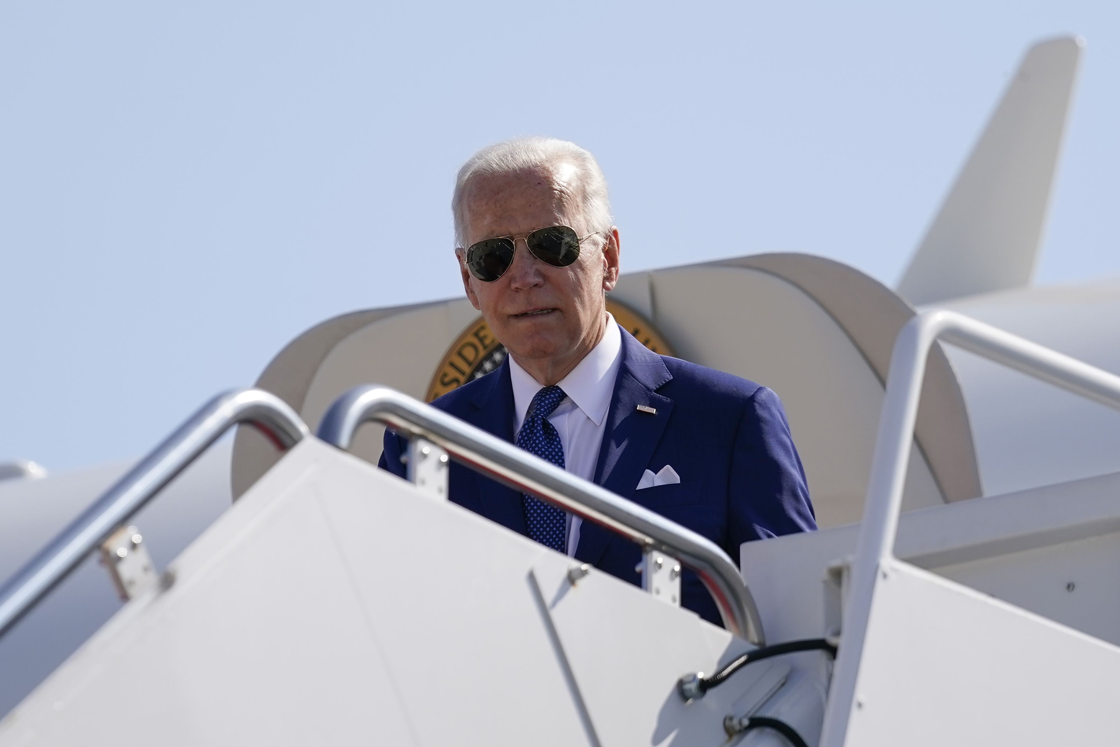President Joe Biden arrives on Air Force One at Andrews Air Force Base, Md., Monday, en route to Washington. Biden will push for a new ban on assault-style weapons when he talks about his crime prevention plans in Wilkes-Barre, Pa., on Tuesday. 
