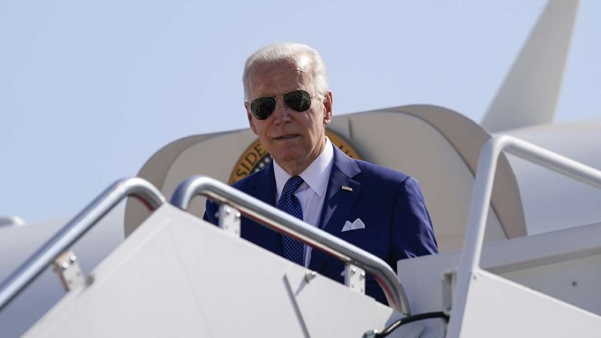 President Joe Biden arrives on Air Force One at Andrews Air Force Base, Md., Monday, en route to Washington. Biden will push for a new ban on assault-style weapons when he talks about his crime prevention plans in Wilkes-Barre, Pa., on Tuesday.