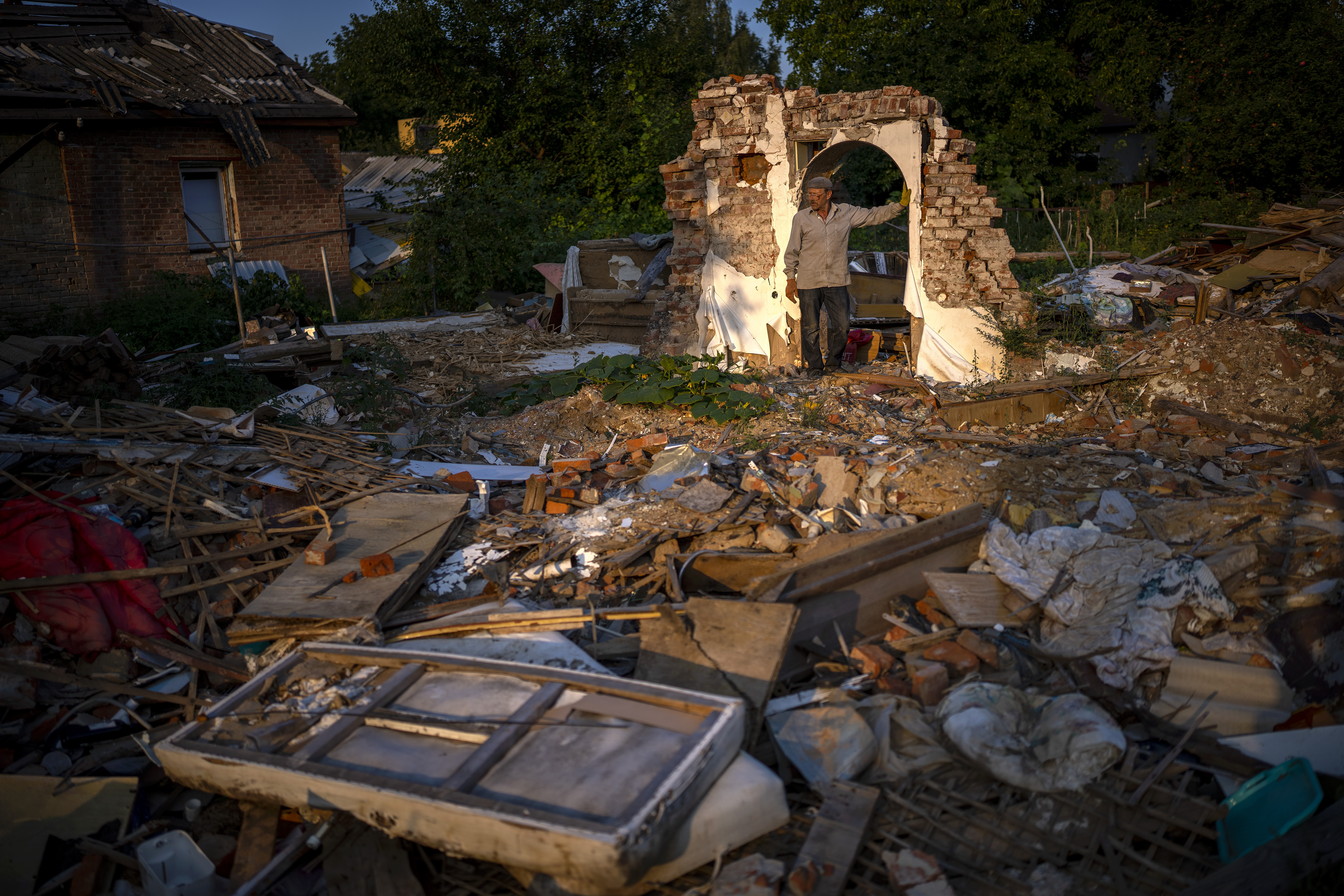 Vladimir, 66, stands next to the wreckage of his house after being bombed by Russians in Chernihiv, Ukraine, Monday. A surge in fighting on Ukraine's southern front is fueling speculation that the long-awaited Ukrainian counteroffensive to try to turn the tide of the war is under way.