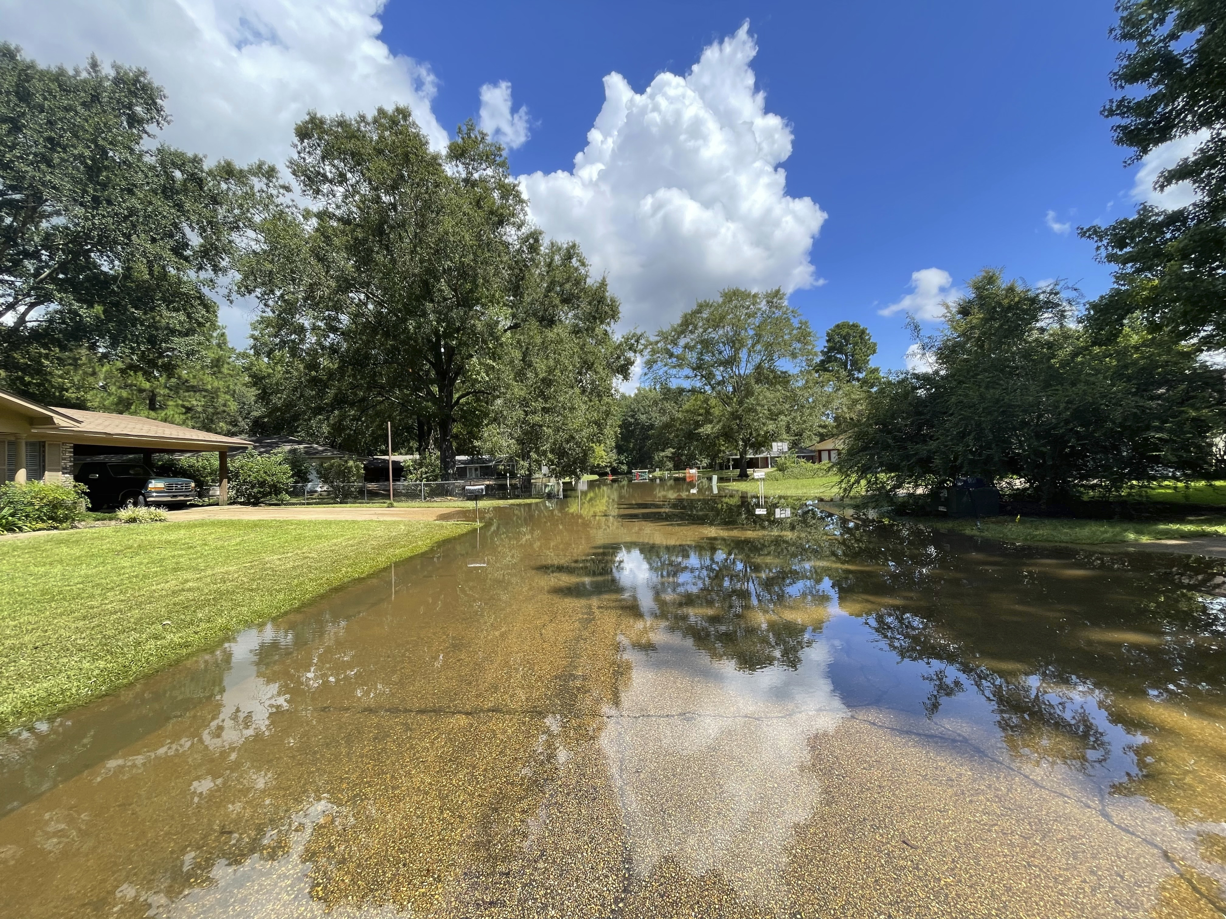 Floodwaters covered the streets in some parts of the North Canton Circle neighborhood of Jackson, Miss., on Monday.