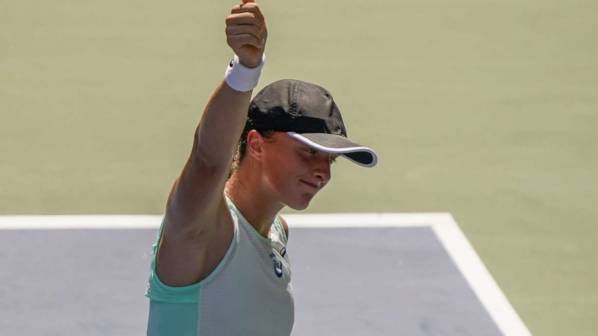 Iga Swiatek, of Poland, reacts after defeating Jasmine Paolini, of Italy, during the first round of the US Open tennis championships, Tuesday, Aug. 30, 2022, in New York.