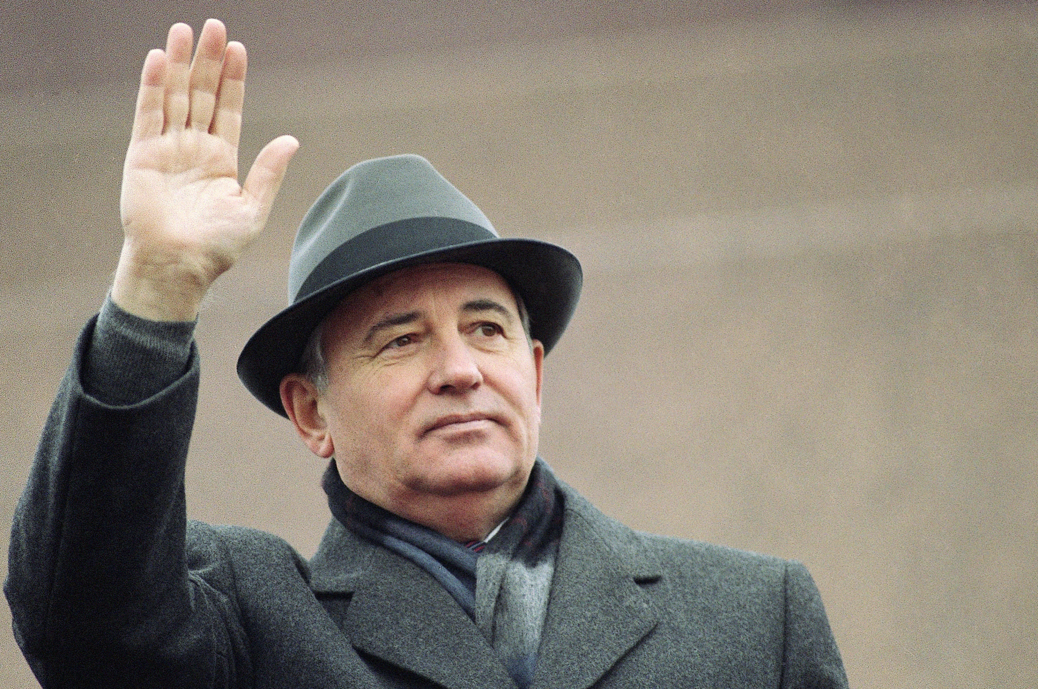Soviet President Mikhail Gorbachev waves from the Red Square tribune during a Revolution Day celebration, in Moscow, Soviet Union, Nov. 7, 1989. Russian news agencies are reporting that former Soviet President Mikhail Gorbachev has died at 91. 