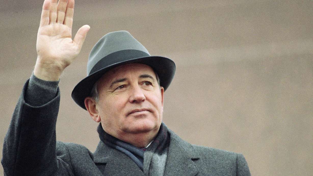 Soviet President Mikhail Gorbachev waves from the Red Square tribune during a Revolution Day celebration, in Moscow, Soviet Union, Nov. 7, 1989. Russian news agencies are reporting that former Soviet President Mikhail Gorbachev has died at 91.