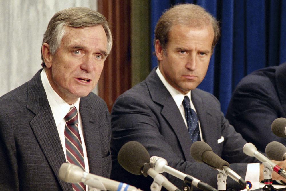 Sen. Lawton Chiles, D-Fla., left, and Sen. Joseph Biden, D-Del., talk to reporters about a legislative package to address the problem of crack cocaine on Aug. 5, 1986, on Capitol Hill in Washington. Some borrowers of color stand to benefit less from President Bides’s proposal to provide student loan forgiveness as at least a generation of Black and Hispanic Americans were disproportionately shut out of the Pell Grant program, due to a “war on drugs” era policy that he supported as a U.S. senator.