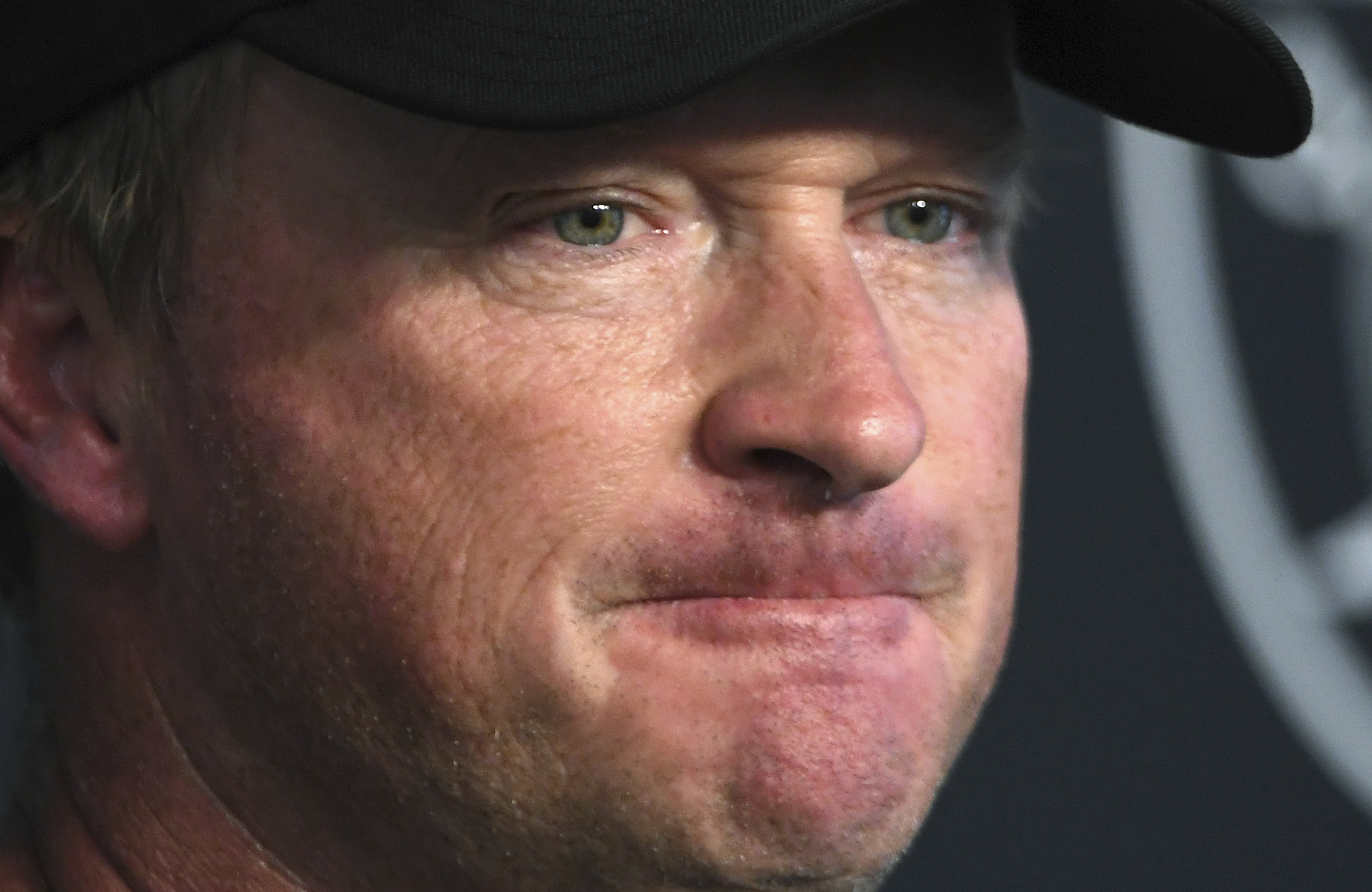 FILE - Las Vegas Raiders head coach Jon Gruden speaks to the media after an NFL football practice in Henderson, Nev., Saturday, July 31, 2021, file photo. Former Raiders coach Jon Gruden says he is “ashamed” about his old offensive emails that cost him his job and hopes to get another chance in football. Gruden spoke publicly Tuesday, Aug. 30 about the affair at the Little Rock Touchdown Club for the first time since he resigned as coach of the Raiders last October. 