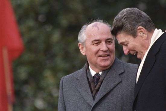 U.S. President Ronald Reagan, right, talks with Soviet leader Mikhail Gorbachev during arrival ceremonies at the White House where the superpowers begin their three-day summit talks in Washington, Dec. 8, 1987. Russian news agencies are reporting that former Soviet President Mikhail Gorbachev has died at 91.