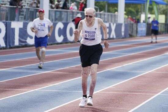Richard Soller, 95, runs in the 200 meter race for men over 85 years old at the National Senior Games on May 16, in Miramar, Fla. After a torn hamstring stopped him from running track in high school, he fell into an unhealthy lifestyle in early adulthood, smoking two packs of cigarettes a day. But he and his wife Jean quit cold turkey when their daughter Mary came along.