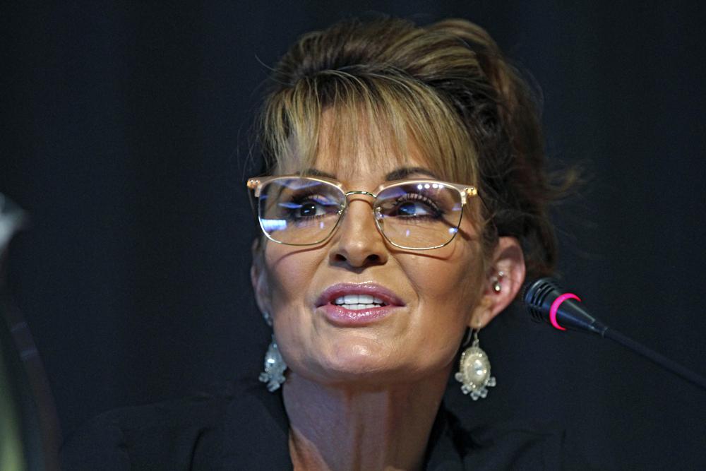 Sarah Palin, a Republican seeking the sole U.S. House seat in Alaska, speaks during a forum for candidates May 12, in Anchorage, Alaska. Democrat Mary Peltola won the special election for Alaska's only U.S. House seat on Wednesday, besting a field that included Palin.