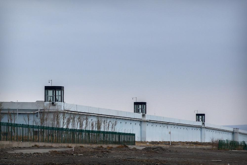 Guard towers stand on the perimeter wall of the Urumqi No. 3 Detention Center in Dabancheng in western China's Xinjiang Uyghur Autonomous Region on April 23, 2021. China's discriminatory detention of Uyghurs and other mostly Muslim ethnic groups in the western region of Xinjiang may constitute crimes against humanity, the U.N. human rights office said in a long-awaited report released Wednesday.