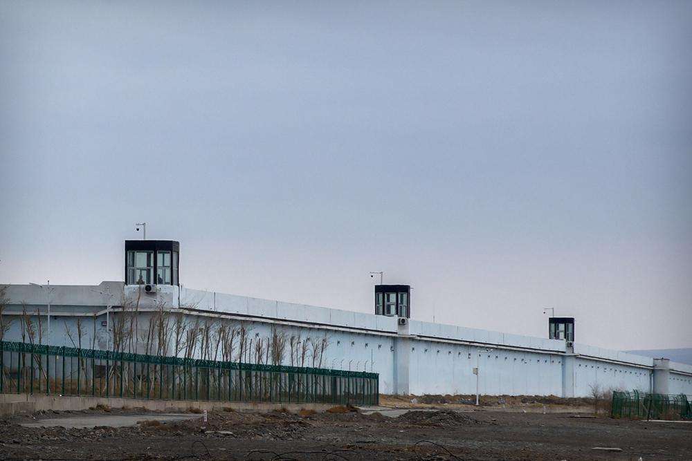 Guard towers stand on the perimeter wall of the Urumqi No. 3 Detention Center in Dabancheng in western China's Xinjiang Uyghur Autonomous Region on April 23, 2021. China's discriminatory detention of Uyghurs and other mostly Muslim ethnic groups in the western region of Xinjiang may constitute crimes against humanity, the U.N. human rights office said in a long-awaited report released Wednesday.